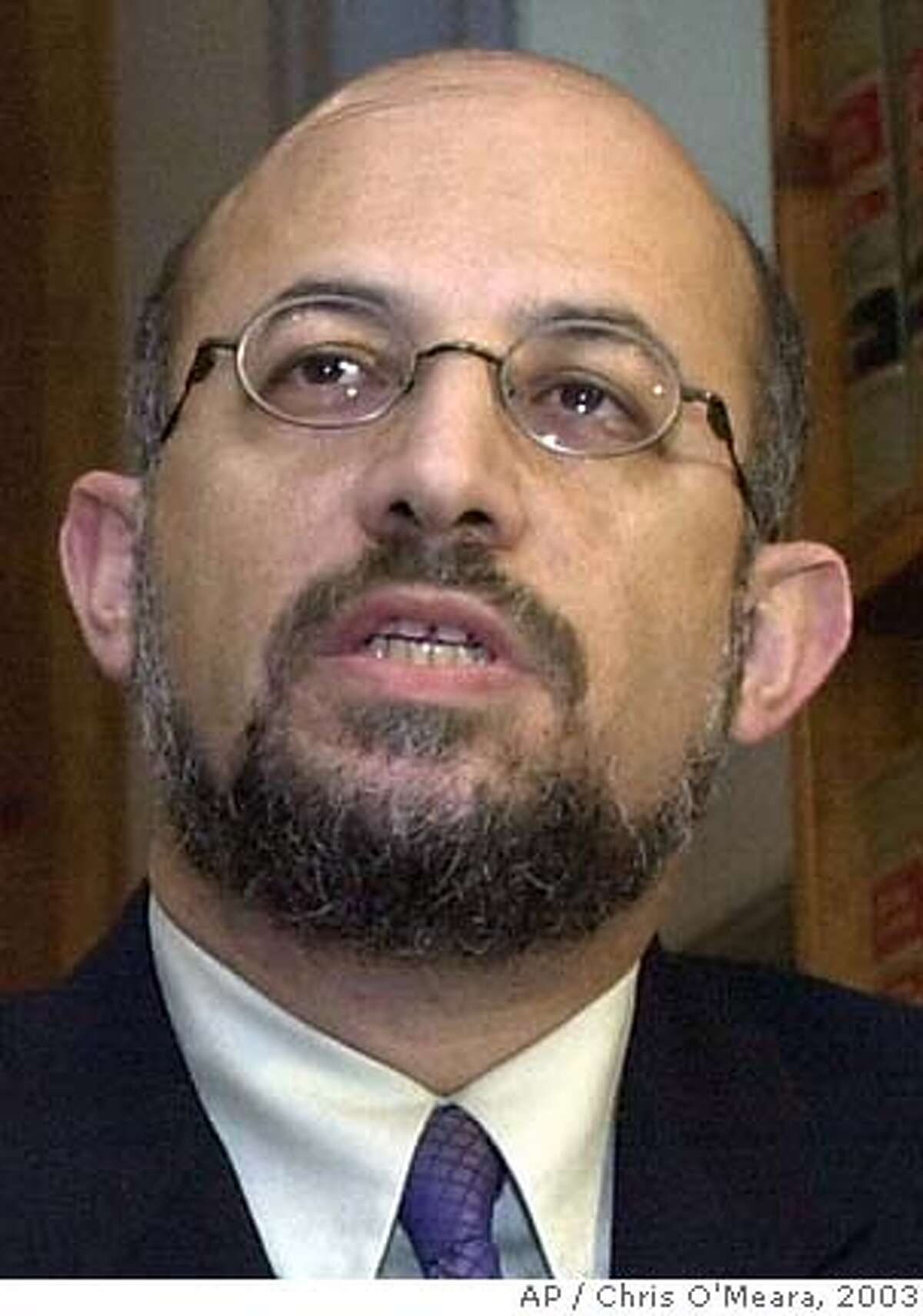 ** FILE ** Suspended University of South Florida professor Sami Al-Arian is seen in a Jan. 6, 2003, file photo in Tampa, Fla. Nearly a year after Al-Arian and seven others were named in a 50-count racketeering indictment, the case is shaping up to be a test of the Patriot Act. The legal battle lines are drawn by Al-Arian's defense team and by Al-Arian himself, who for years has said he is being persecuted for his pro-Palestinian, anti-Israeli views. (AP Photo/Chris O'Meara, File) JAN. 6, 2003, FILE PHOTO Sami Al-Arian (left) and his brother-in-law, Mazen Al-Najjar, are accused of having ties to the Palestinian Islamic Jihad.