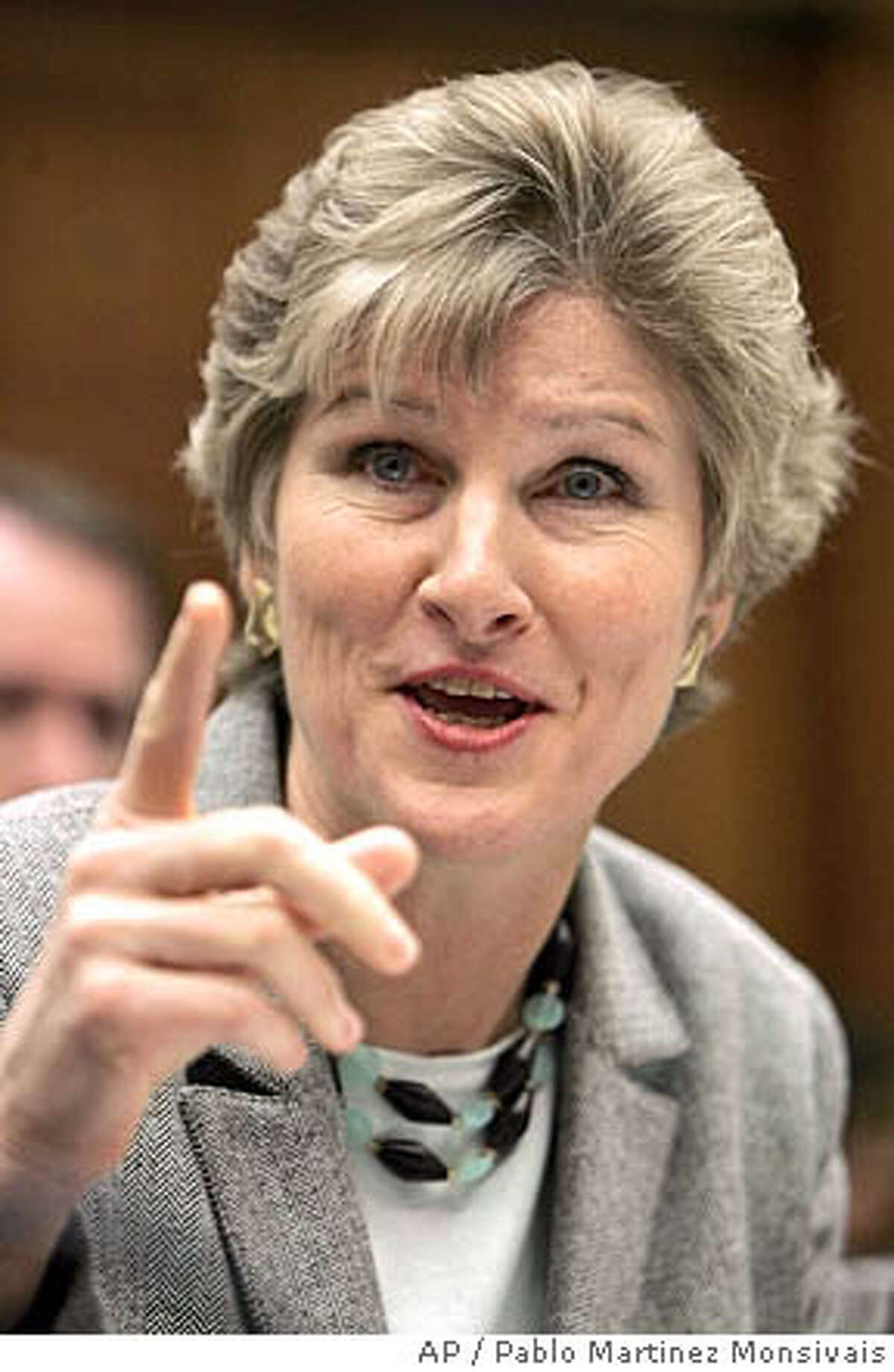Undersecretary of State Karen Hughes gestures while testifying on Capitol Hill, Thursday, Nov. 10, 2005 before the House International Relations Committee hearing on public diplomacy worldwide. (AP Photo/Pablo Martinez Monsivais)
