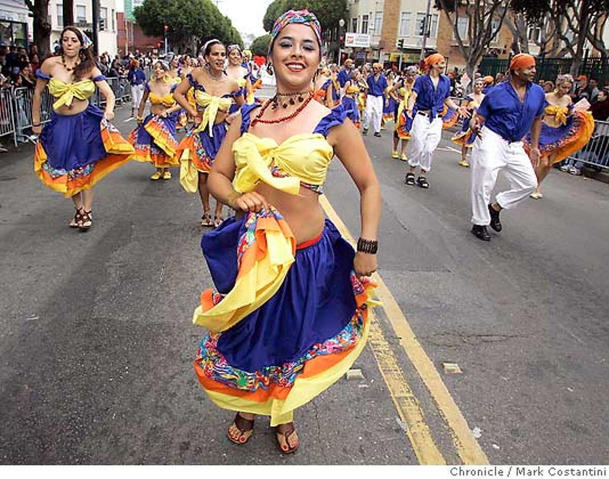 A troupe of Columbian dancers on 24th St. at the annual parade held in the Mission district PHOTO: Mark Costantini / The Chronicle