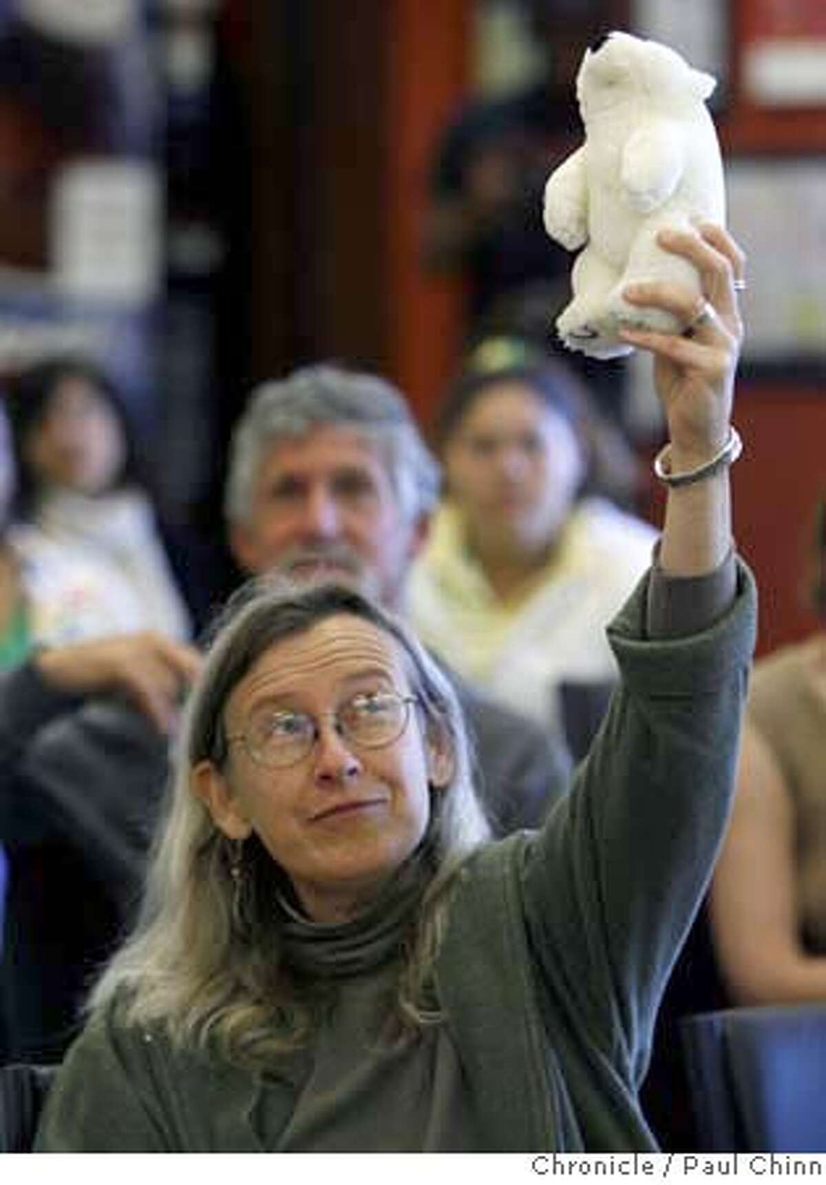 Activist Redwood Mary took on the role of a polar bear during a greenhouse gas demonstration by Albany High student Jacob Delbridge at the Climate Action Kickoff rally in Berkeley, Calif. on Saturday, May 19, 2007. PAUL CHINN/The Chronicle **Redwood Mary, Jacob Delbridge MANDATORY CREDIT FOR PHOTOGRAPHER AND S.F. CHRONICLE/NO SALES - MAGS OUT