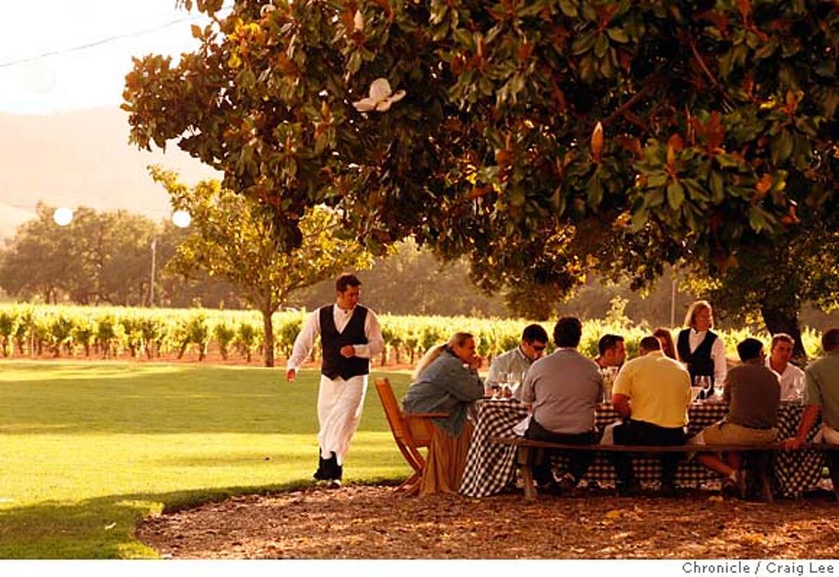 winepicnics25_347_cl.JPG Story on wineries that have picnic areas. This is the picnic area at Chateau St. Jean in Kenwood. Photo of a company from Nashville, Tennessee, Lipman Brothers, having a catered picnic. Event on 5/17/07 in Kenwood. photo by Craig Lee / The Chronicle MANDATORY CREDIT FOR PHOTOG AND SF CHRONICLE/NO SALES-MAGS OUT