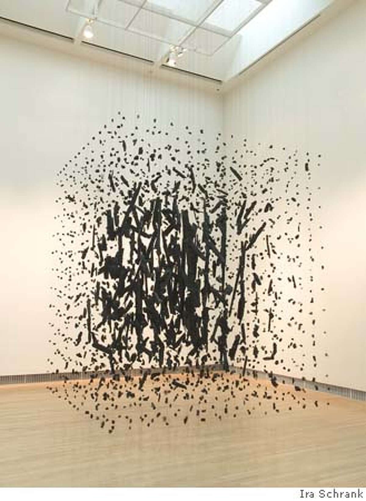 Cornelia Parker, Mass, 1997. Wire, string, burnt wood retrieved from the Baptist Church of Lytle, Texas (struck by lightning) Collection of the Phoenix Art Museum, museum purchase with funds provided by Dr. and Mrs. Howard J. Hendler. Photo by Ira Schrank