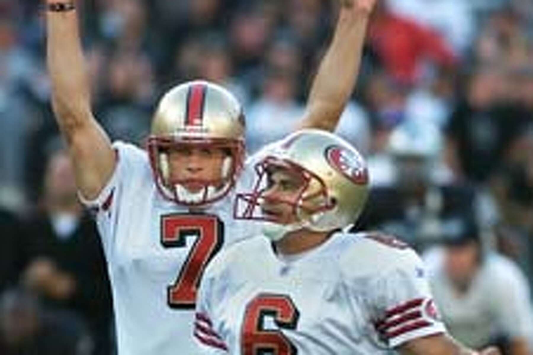 Kicker Joe Nedney and holder Andy Lee of the San Francisco 49ers