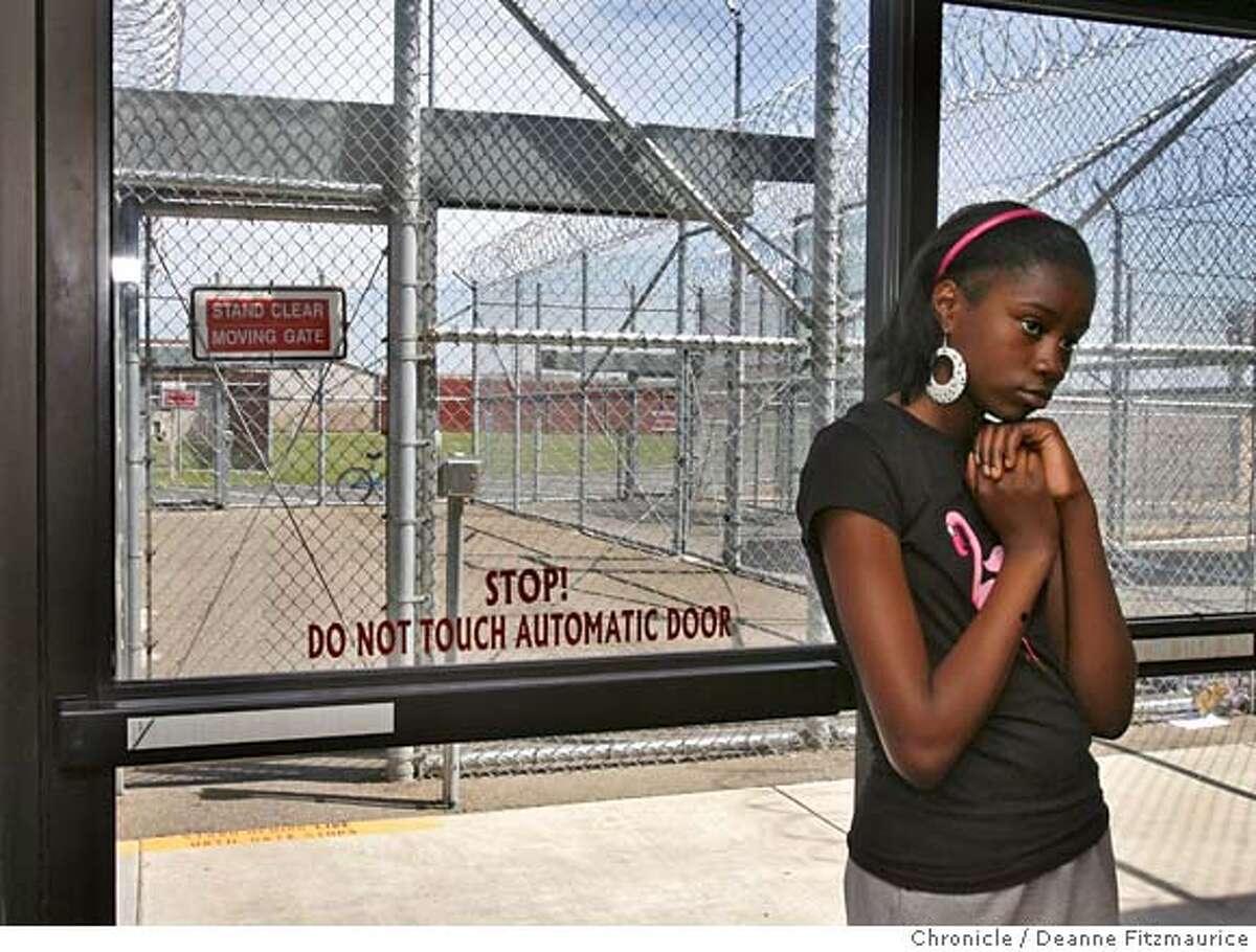 prisonmom_090_df.jpg Renecia Threadgill (cq), from San Francisco, celebrating her 13th birthday, waits to get through security to visit her mother who she hasn't seen in a year. The Chowchilla Family Express is a bus which takes children from the Bay Area to see their mothers who are incarcerated at Valley State Prison for Women. Photographed in Chowchilla on 5/6/07. Deanne Fitzmaurice / The Chronicle Ran on: 05-14-2007 Renecia Threadgill, 13, waits to get through security at the Valley State Prison for Women to visit her mother, whom she hasnt seen in a year.