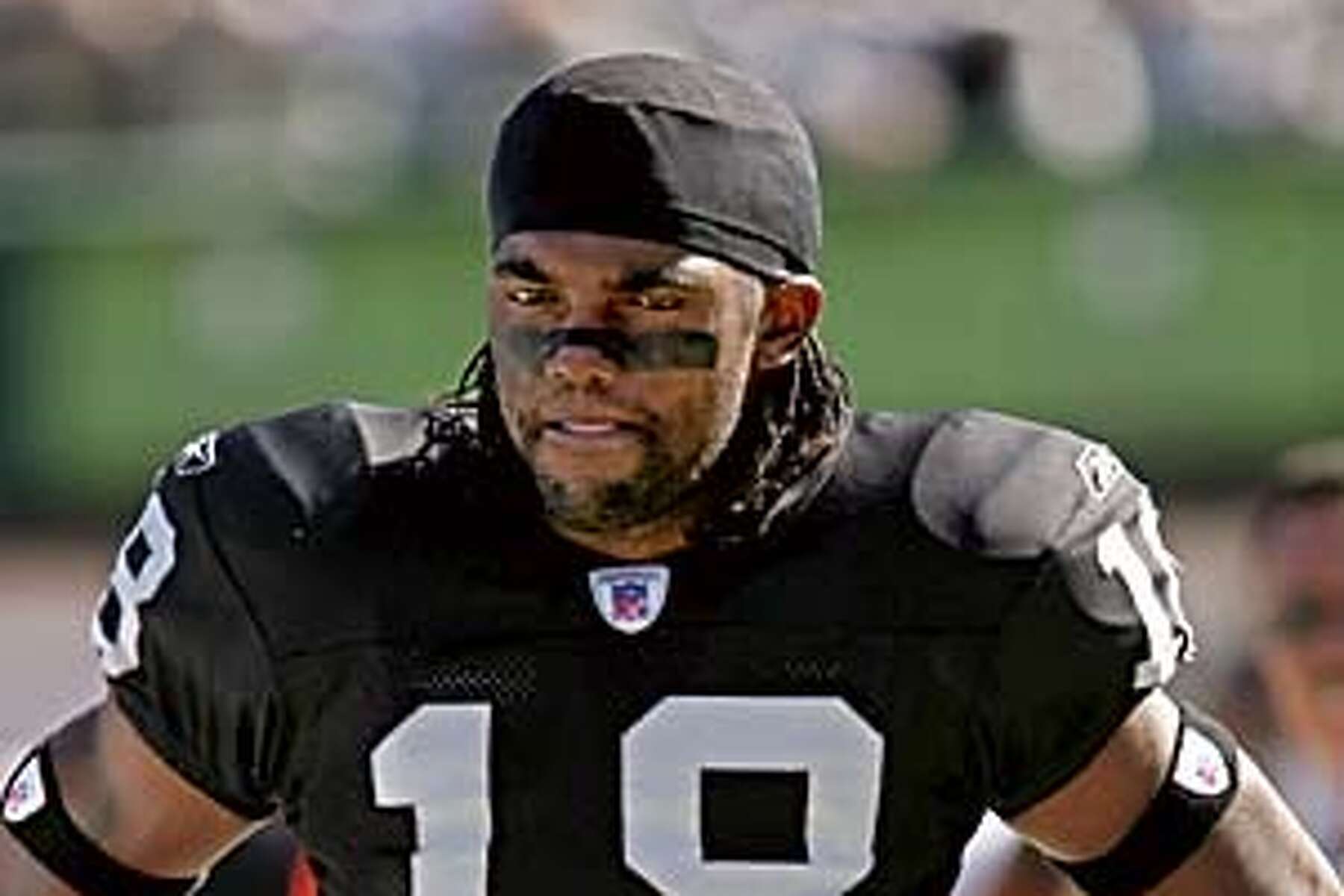 Oakland, California, USA. 13th Nov, 2005. Oakland Raiders wide receiver  Randy Moss (18) on Sunday, November