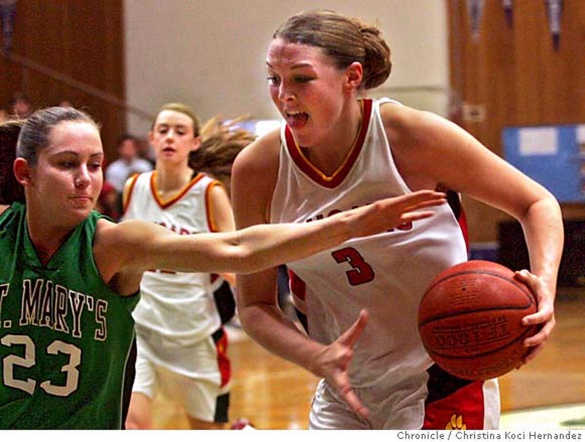(R)Crondolet#3, Jayne Appel, fights for ball awith (L)St. Mary's Stockton, #23, Jacki Gamelos.girls basketball: St. Mary's of Stockton vs. Carondelet. St. Mary's is defending state Division III champion; Carondelet is defending state Division II champion. This is the premiere game of the Velocity Sports Performance Shootout at Acalanes High. .CHRISTINA KOCI HERNANDEZ/CHRONICLE