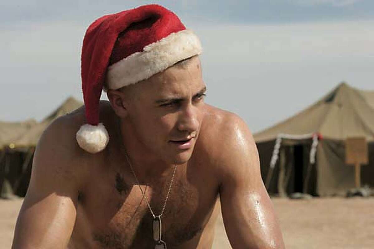 JAKE GYLLENHAAL as Anthony Swofford celebrates a lonely Christmas in Sam Mendes? JARHEAD.