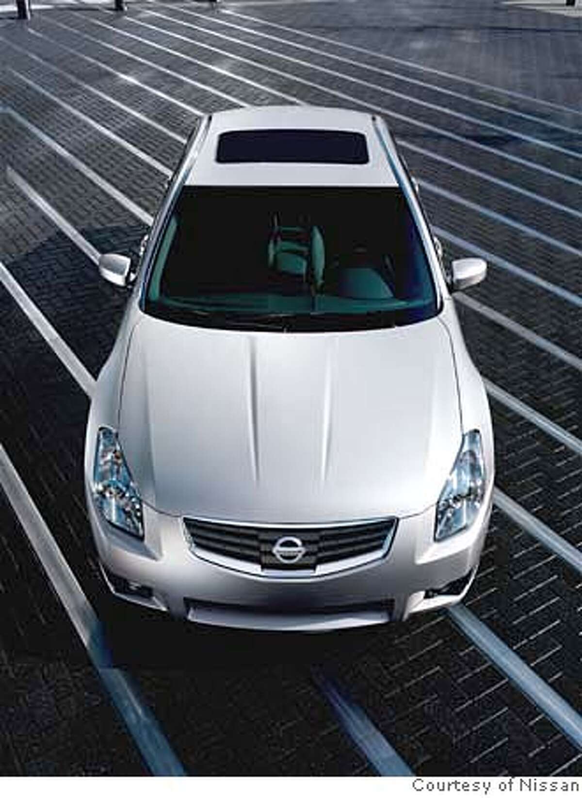 The Maxima and sibling rivalry / Sporty Nissan handles, brakes well ...