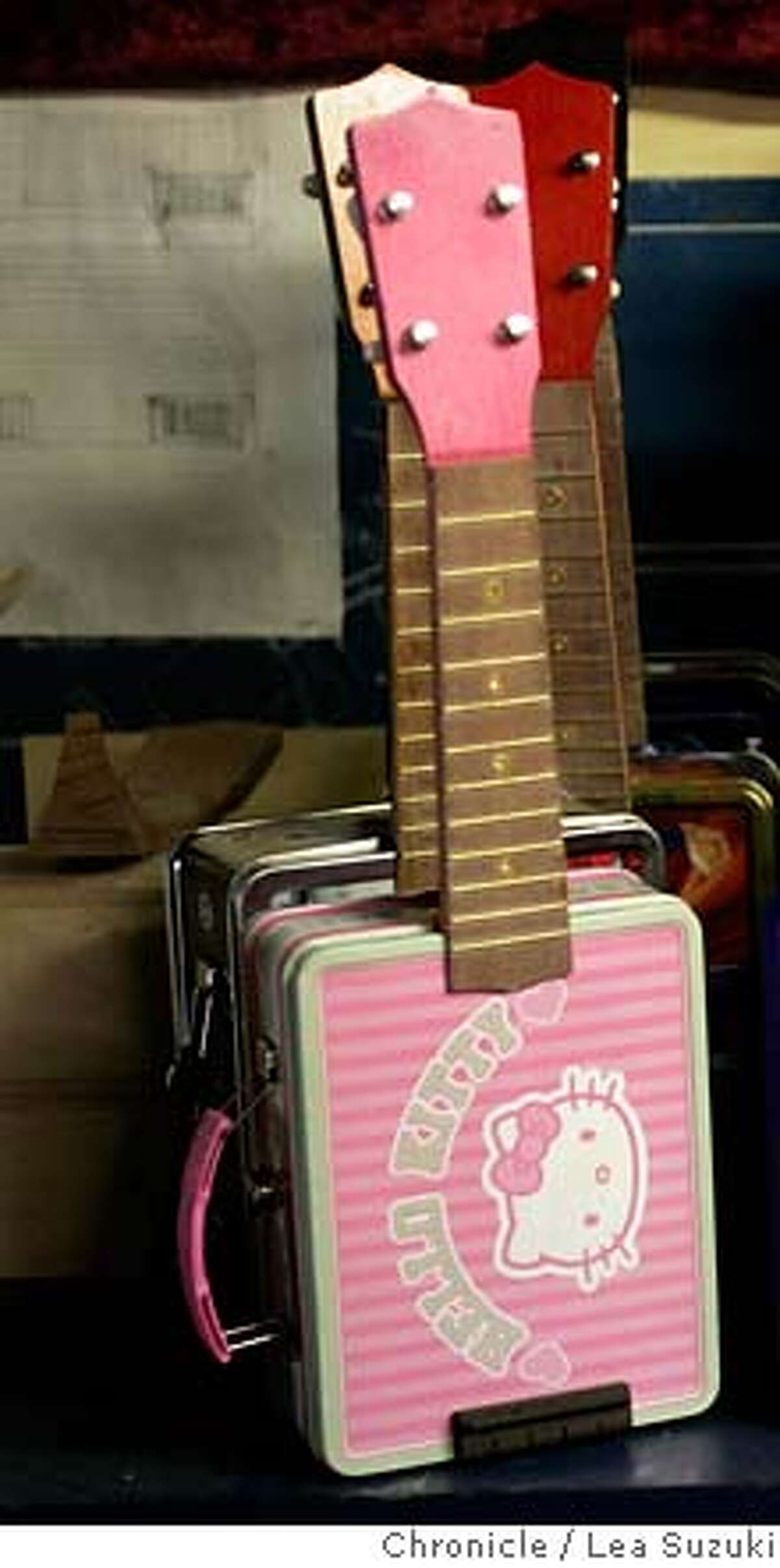 ukelele_064_ls.JPG A set of Lunchbox-A-Leles ready to be strung, tuned and sent out. Ukelele Ray, who makes ukeleles out of lunchboxes, in his ukelele museum and the ukelele workshop in Ray's garage in San Francisco on Monday November 20, 2006. Photo by Lea Suzuki/The San Francisco Chronicle Photo taken on 11/20/06, in San Francisco, CA. **(themselves) cq. MANDATORY CREDIT FOR PHOTOG AND SAN FRANCISCO CHRONICLE/NO SALES-MAGS OUT