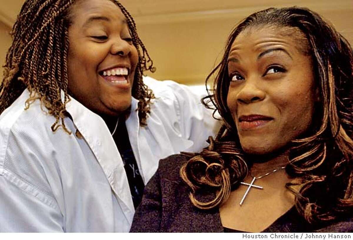 WNBA star Sheryl Swoopes, right, talks to reporters with her partner Alisa Scott, left, about being gay, Wednesday, Oct. 26, 2005. Swoopes, honored last month as the WNBA's Most Valuable Player, told ESPN The Magazine for a story on newsstands Wednesday that she didn't always know she was gay and fears that coming out could jeopardize her status as a role model. (AP Photo/Houston Chronicle, Johnny Hanson) ** MANDATORY CREDIT, , MAGS OUT, TV OUT, INTERNET: AP MEMBERS ONLY ** MANDATORY CREDIT: , MAGS OUT, TV OUT, INTERNET: AP MEMBERS ONLY