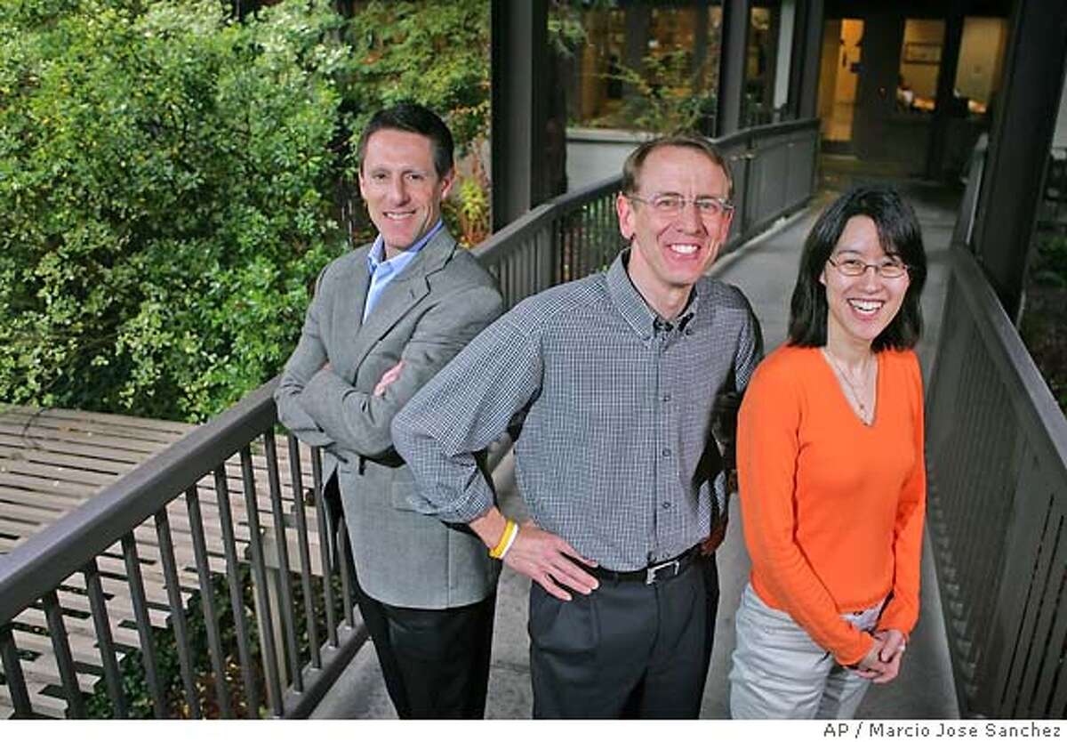 Venture capitalist John Doerr, middle, poses for a portrait with partners John Denniston, left, and Ellen Pao outside of their office in Menlo Park, Calif., April 4, 2006. Doerr is betting on an emerging sector known as clean technology with plans to devote $100 million to green technologies that help provide cleaner energy, transportation, air and water. (AP Photo/Marcio Jose Sanchez) Ran on: 12-09-2006 John Denniston said the organization is already talking with Congress. Ran on: 03-15-2007 John Doerr is pushing for green technology nationwide.