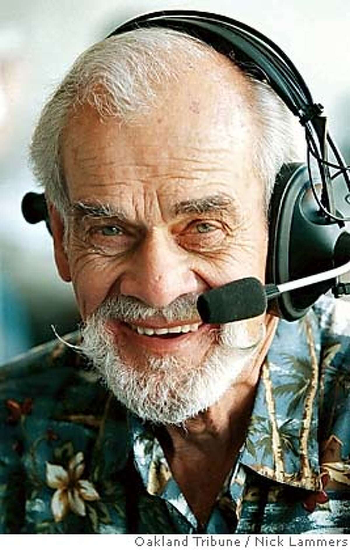 Longtime Oakland Athletics radio voice Bill King is shown in this photo taken Thursday, April 15, 1999, in Oakland Calif. King, whose signature call of "Holy Toledo!" was a household phrase for decades in the Bay Area, died early Tuesday, Oct. 18, 2005, from complications following hip surgery. He was 78. The A's said King died about 12:20 a.m. at a hospital in nearby San Leandro, three days after undergoing surgery for an injury sustained earlier this year.