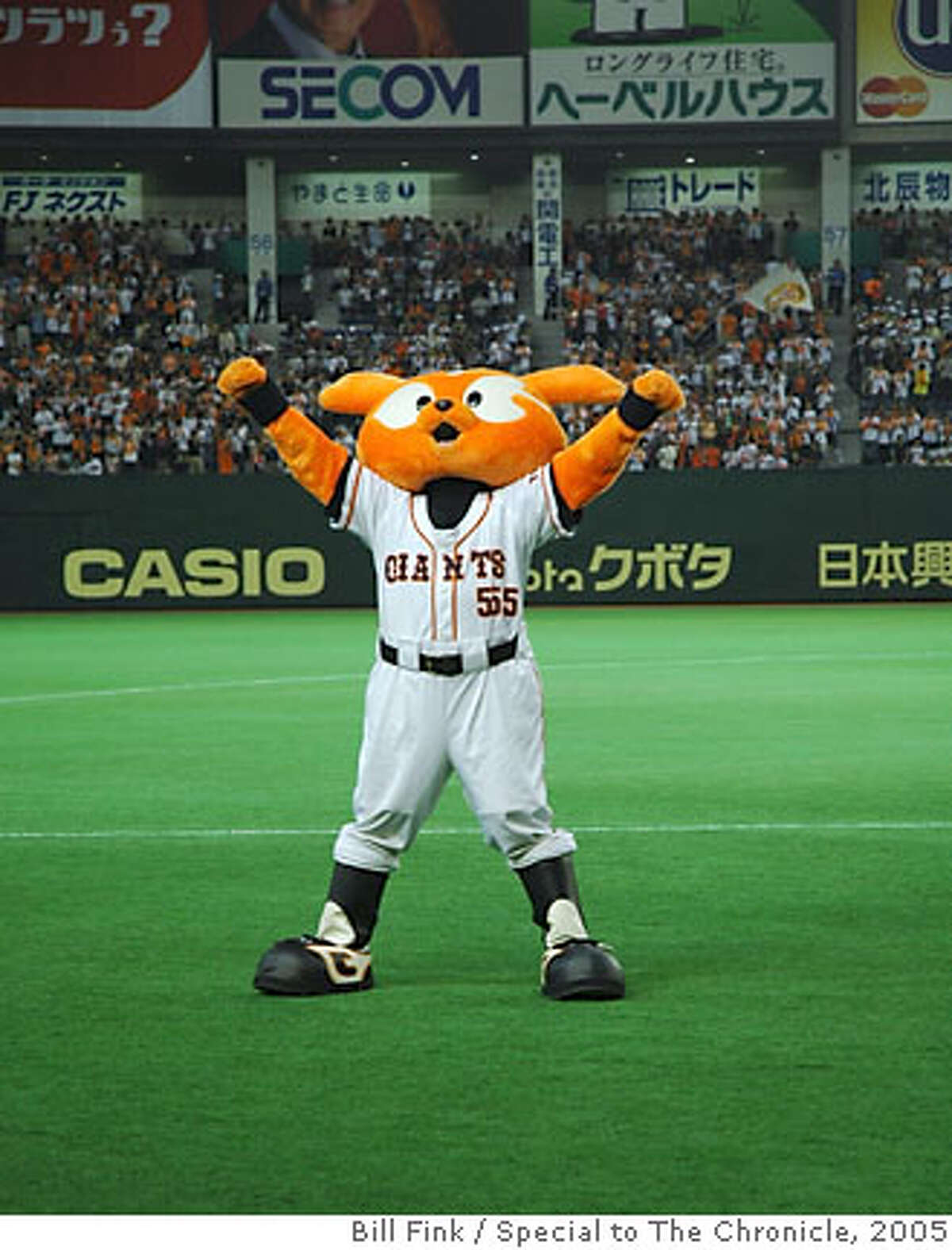 TRAVEL JAPAN BASEBALL -- Giabbit, the mascot of the Yomiuri Giants, performs for the crowd. Bill Fink / Special to the Chronicle One-time use only with Travel story (SFGate OK if also used in print.)