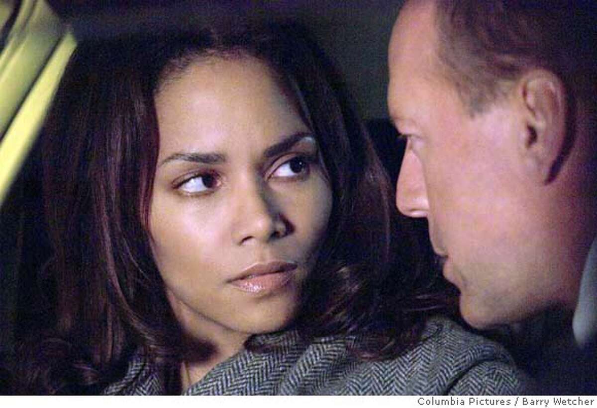 This photo provided by Columbia Pictures shows Halle Berry and Bruce Willis in a scene from "Perfect Stranger." (AP Photo/Columbia Pictures/Barry Wetcher) NO SALES. NO MAGS.