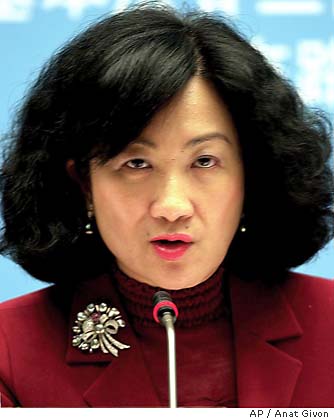 Top Hong Kong officials quit in wake of protests / Both had ties to