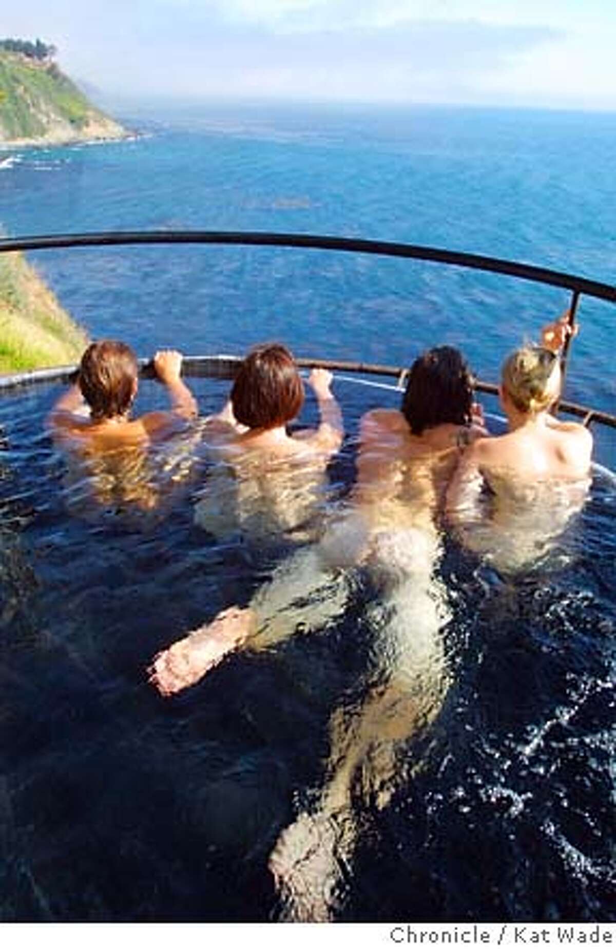 ESALENd-C-28MAY02-MT-KW - (l to r) Katrina Dunbar, Emma Dunbar, Jason McMahon and Marianna Pinchot, Esalen workers and staff, enjoy the magnificent view from the temporary hot baths that overlook the ocean at the Esalen Institute on Hwy 1 in Big Sur, California. SAN FRANCISCO CHRONICLE PHOTO BY KAT WADE Ran on: 04-15-2007 Esalen workers and staff enjoy the magnificent view from temporary hot springs baths overlooking the ocean.