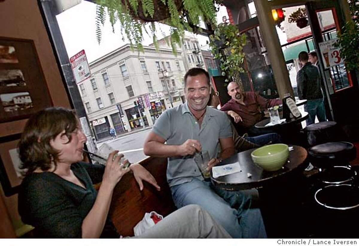 POLKSTREET25_0221.jpg_ Stephanie Ghertner and Robert O'Connor enjoy Mojitos at the Lush Lounge on Polk St. The Lush along with several other neighborhood bars have been gradually transforming into up-scale bars in recent years. The gentrification of lower Polk Gulch, primarily Polk Street. Many are blaming a new museum like restaurant called O'Reilly's Holy Grail, between Bush and Sutter, for paving the road to trendy Ville. Neighborhood association loves all the swanky new bars but gay activists say they are trying to drive out the transsexuals and tweakers that have long defined the area. By Lance Iversen/San Francisco Chronicle MANDATORY CREDIT PHOTOG AND SAN FRANCISCO CHRONICLE.