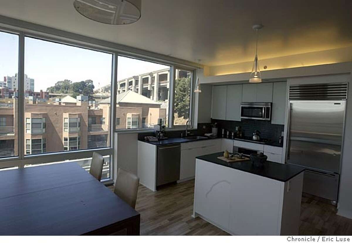 MODEL HOME The Watermark, Unit C / ON THE WATERFRONT / A highrise