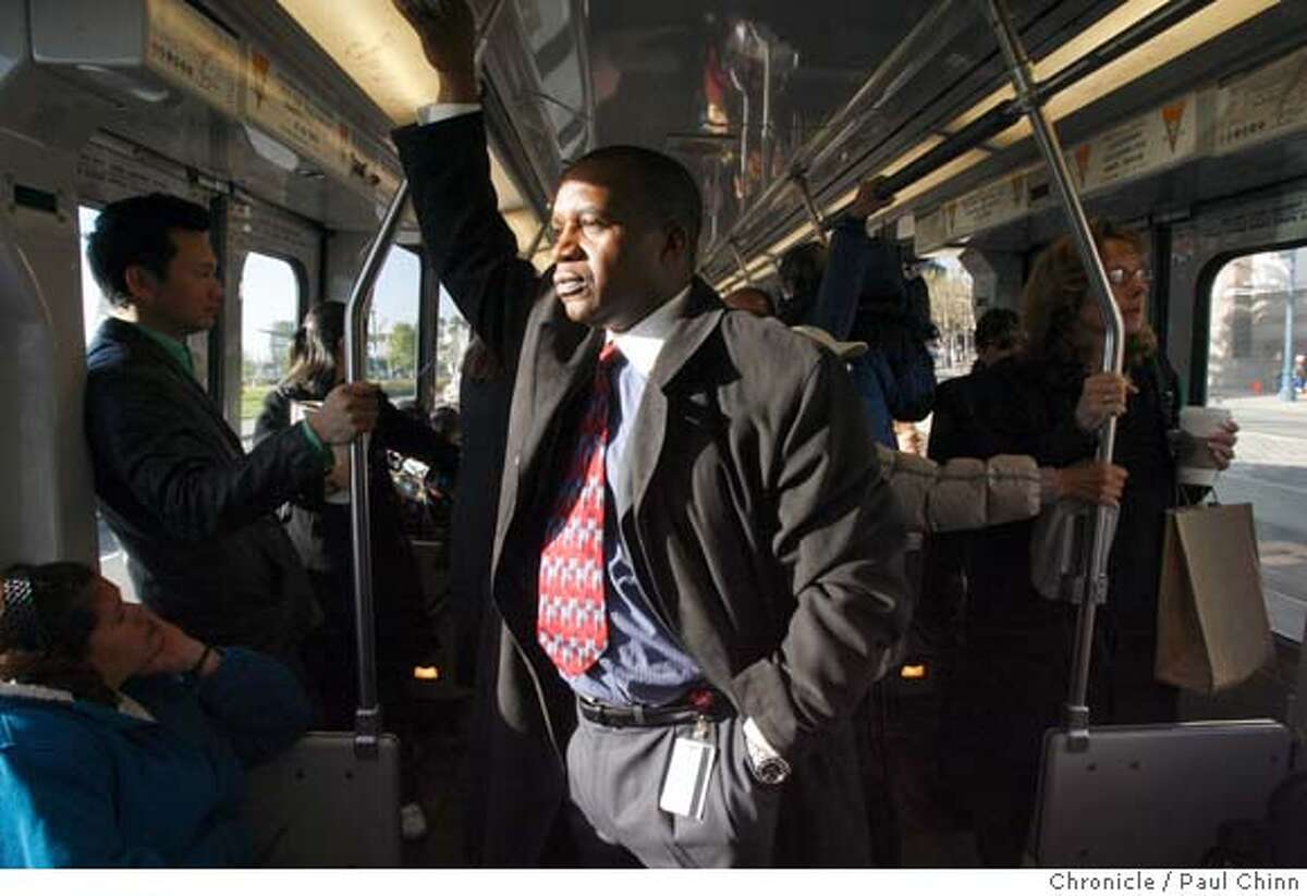 MTA director Nathaniel Ford rides an inbound T-Third Muni Metro train to monitor glitches in the system in San Francisco, Calif. on Thursday, April 12, 2007 following three days of delays caused by the launch of the T-Third line. PAUL CHINN/The Chronicle **Nathaniel Ford