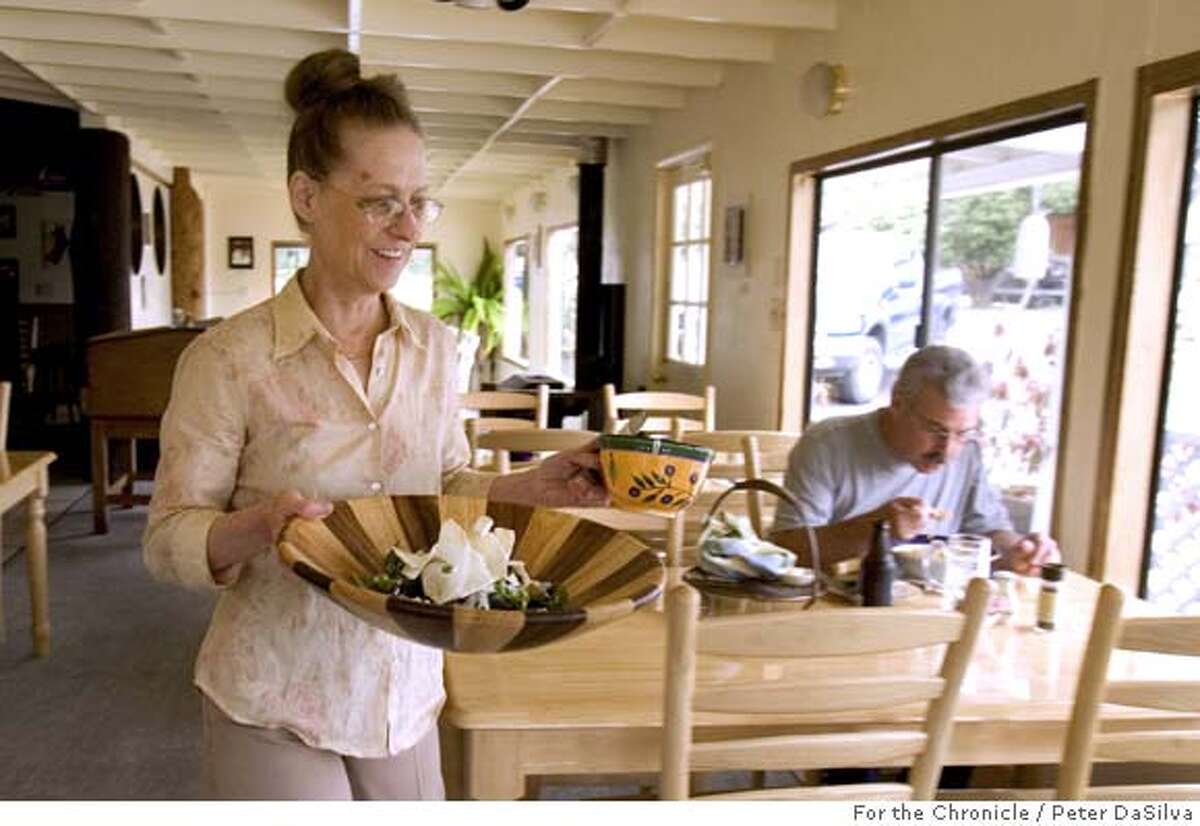 Fort Bragg, Calif., Sept. 13, 2005; Colleen Murphy owner/chef/waitress waits on tables at her restaurant Chapter and Moon in Fort Bragg, Calif. (Mandatory Credit: Photo by Peter DaSilva for the San Francisco Chronicle