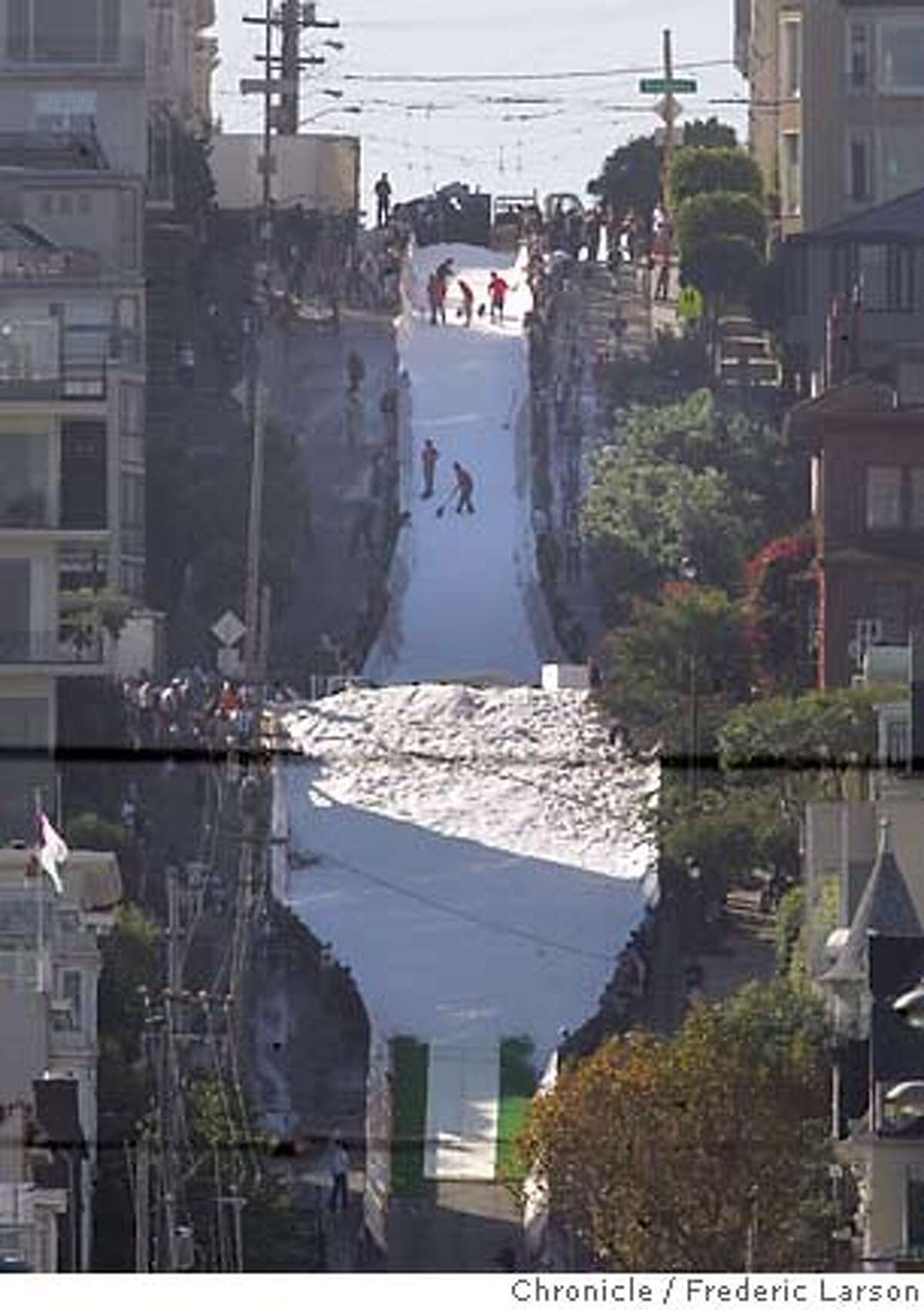 SKIJUMP13_0594_fl.jpg 10am -photo's of progress every 15 minutes from the foot of Filmore Street and Marina- Icer Air 2005, a promotional ski-jump contest took over an intersection of San Francisco's Fillmore Street and surrounding blocks in Pacific Heights Wednesday afternoon. And residents who live near the section of the Fillmore Street hill where the jumpers will be flying Thursday -- and who objected to the issuing of city permits for the event because of the disruption it would cause and financial risk the city would face -- are angrier than before. Snow blowing begins at 7am; practice at 10am; the Jumps happen from noon to 4pm...ry Photographer:� 9/29/05 San Francisco CA Frederic Larson The San Francisco Chronicle