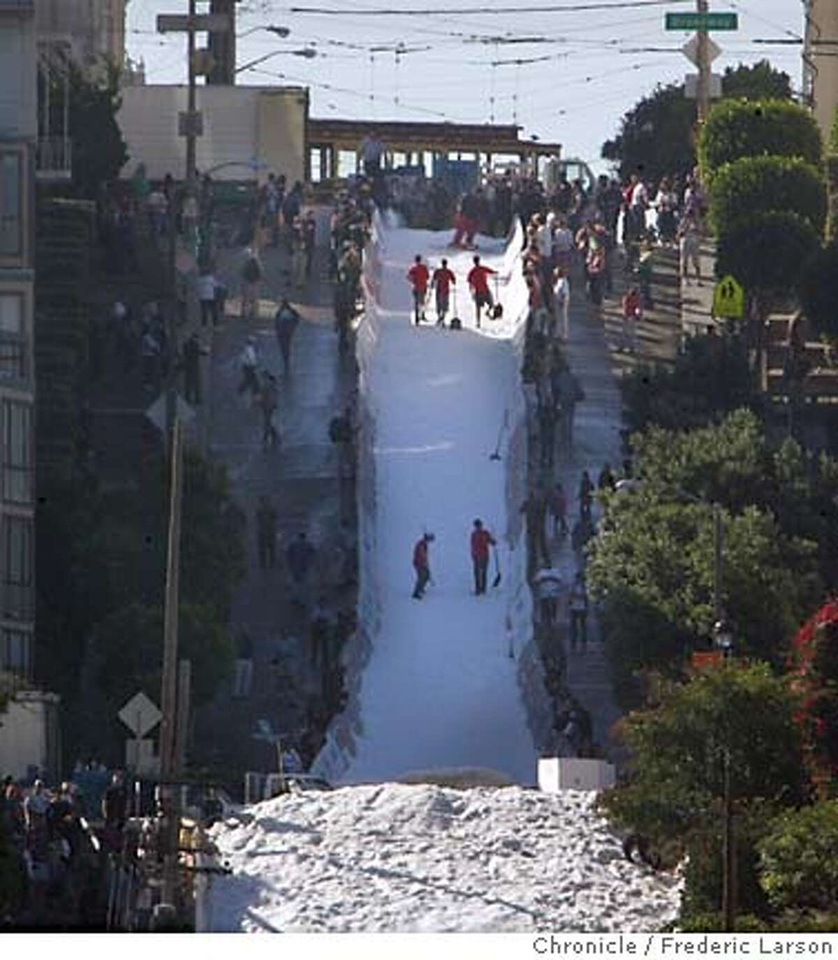SKIJUMP13_0554_fl.jpg 10am -photo's of progress every 15 minutes from the foot of Filmore Street and Marina- Icer Air 2005, a promotional ski-jump contest took over an intersection of San Francisco's Fillmore Street and surrounding blocks in Pacific Heights Wednesday afternoon. And residents who live near the section of the Fillmore Street hill where the jumpers will be flying Thursday -- and who objected to the issuing of city permits for the event because of the disruption it would cause and financial risk the city would face -- are angrier than before. Snow blowing begins at 7am; practice at 10am; the Jumps happen from noon to 4pm...ry Photographer:� 9/29/05 San Francisco CA Frederic Larson The San Francisco Chronicle