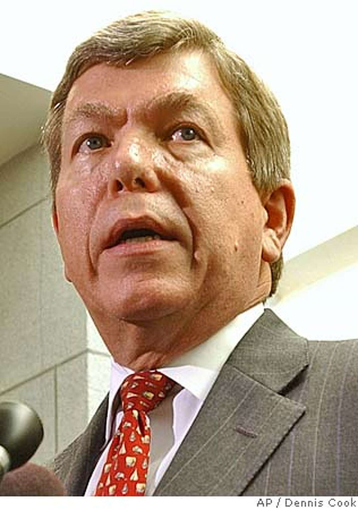 Representative Roy Blunt, R-Mo., left, talks to reporters on Capitol Hill Wednesday, Sept. 28, 2005, after being named to succeed Rep. Tom Delay, R-Tex., as House Majority Leader. DeLay has been indicted by a Texas grand jury on conspiracy charges. (AP Photo/Dennis Cook)