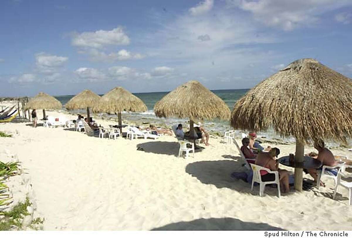 DESTINATION MEXICO / Cozumel's tranquil east side / Empty shore, funky  beach bars set tone for island's other coast