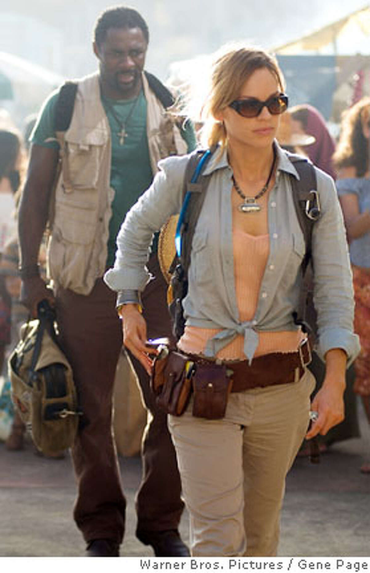 IDRIS ELBA as Ben and HILARY SWANK as Katherine in Warner Bros. Pictures� and Village Roadshow Pictures� supernatural thriller �The Reaping,� distributed by Warner Bros. Pictures.PHOTOGRAPHS TO BE USED SOLELY FOR ADVERTISING, PROMOTION, PUBLICITY OR REVIEWS OF THIS SPECIFIC MOTION PICTURE AND TO REMAIN THE PROPERTY OF THE STUDIO. NOT FOR SALE OR REDISTRIBUTION.