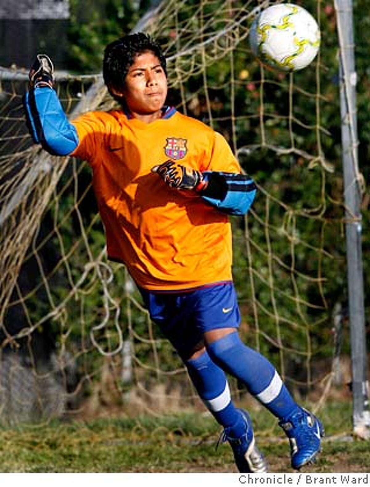 13 year old Francisco Mendoza plays goalie for his youth soccer team. He gets to go to the match Wednesday where he will root for his beloved Mexican Nationals. The Mexican National team has come to town for a match against Ecuador. Many will have to watch the game on television but a few lucky fans will get to attend the game Wednesday night. Youth soccer teams were practicing at Lazear Field Tuesday night...everyone was looking forward to the game. {Brant Ward/San Francisco Chronicle}3/27/07
