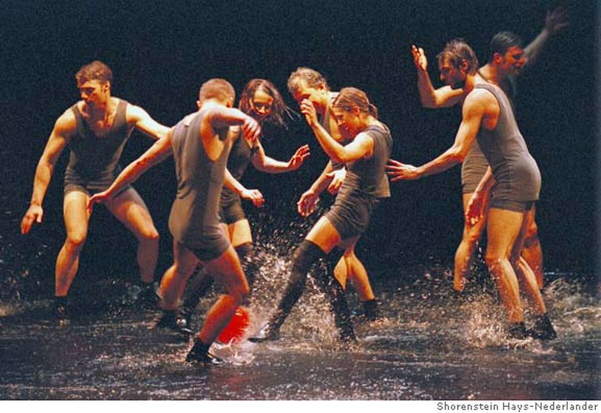 link_1_936.jpg Rain Photo 01 Members of Cirque �loize troupe in RAIN Shorenstein Hays-Nederlander
