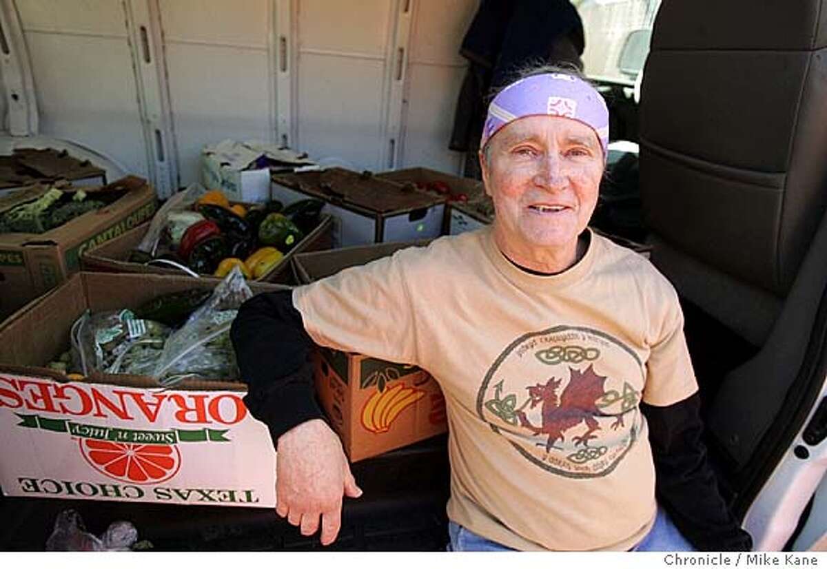 JA_MEEHAN_073_MBK.JPG John Meehan, executive director and founder of Groceries for Senior and recipient of the Jefferson Award, poses in his van after delivering groceries to Margaret Victory, 80, a former Groceries for Seniors volunteer, at her apartment in San Francisco, CA, on Wednesday, March, 21, 2007. photo taken: 3/21/07 Mike Kane / The Chronicle **John Meehan Margaret Victory MANDATORY CREDIT FOR PHOTOG AND SF CHRONICLE/NO SALES-MAGS OUT