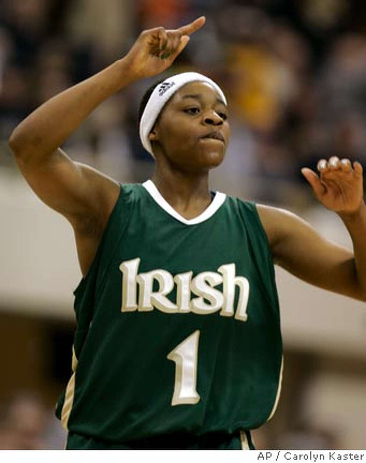 Notre Dame's Tulyah Gaines celebrates their 62-59 during the second half of their NCAA first round basketball game against California in Pittsburgh, Pa., Sunday, March 18, 2007. (AP Photo/Carolyn Kaster)