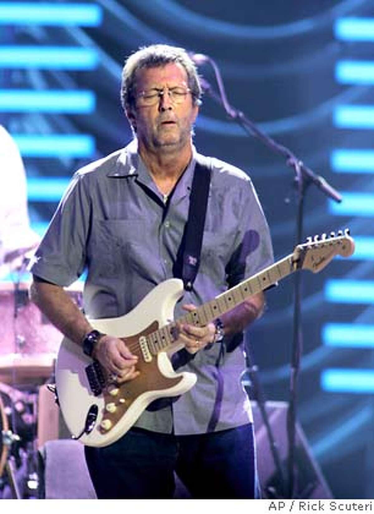 Eric Clapton performs in Phoenix on Sunday, March 11, 2007. (AP Photo/Rick Scuteri)