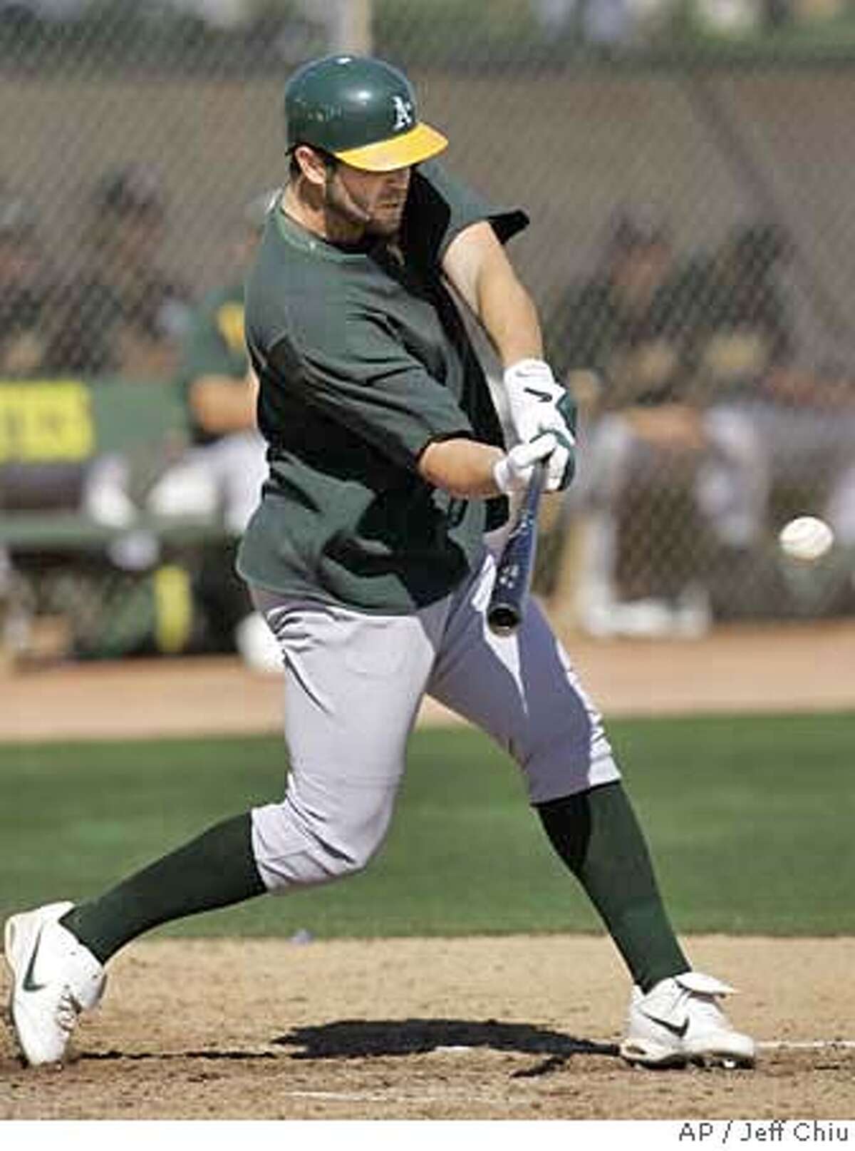 Oakland Athletics' short stop Bobby Crosby makes the throw to