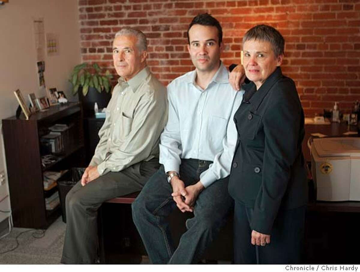 Rapt CEO Tom Chavez, center, and his parents Ray and Rosario in his office. in San Francisco 8/25/05 Chris Hardy / San Francisco Chronicle