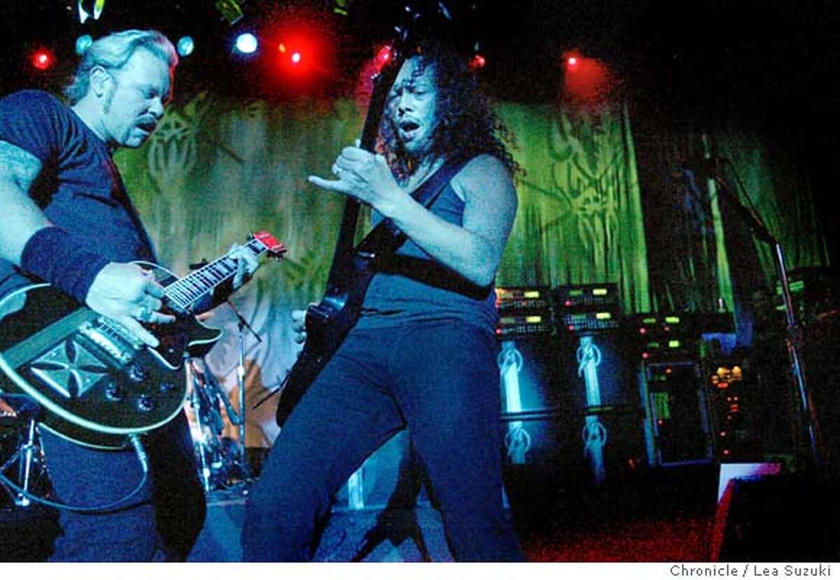 metallica047_ls.jpg Metallica performs at the Fillmore on 5/18/03 in San Francisco. from left: James Hetfield and Kirk Hammett LEA SUZUKI / The Chronicle