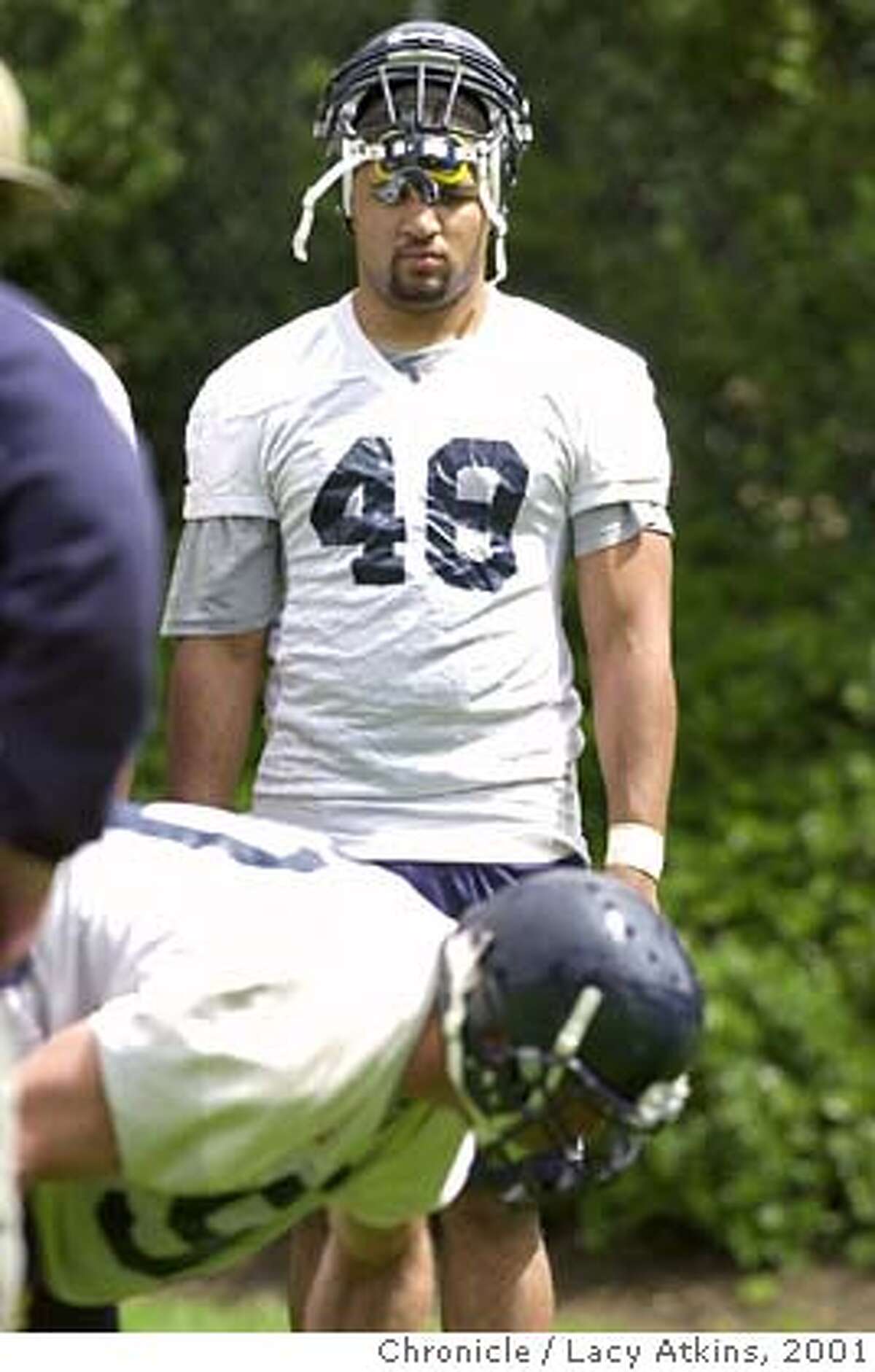 CALFOOTBALLi-C-11AUG01-SP-LA Tully Banta-Cain watches teammates during practice sunday Aug.12,01, in Berkeley. Photo By Lacy Atkins/SanFrancisco Chronicle CAT