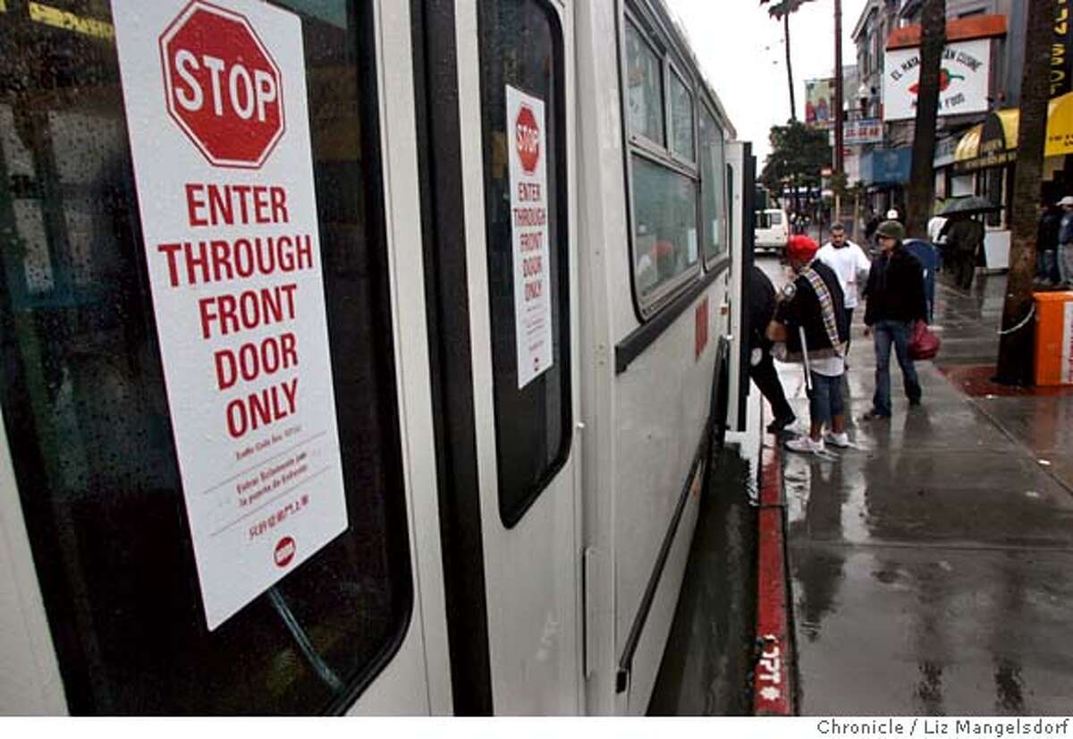 A sign at the back of a bus at 16th and Mission Streets says that it is illegal to board on the back. Story is on how MUNI is not collecting all the fares that it could. Photographed on Feb. 26, 2007 . Photo by Liz Mangelsdorf/ San Francisco Chronicle