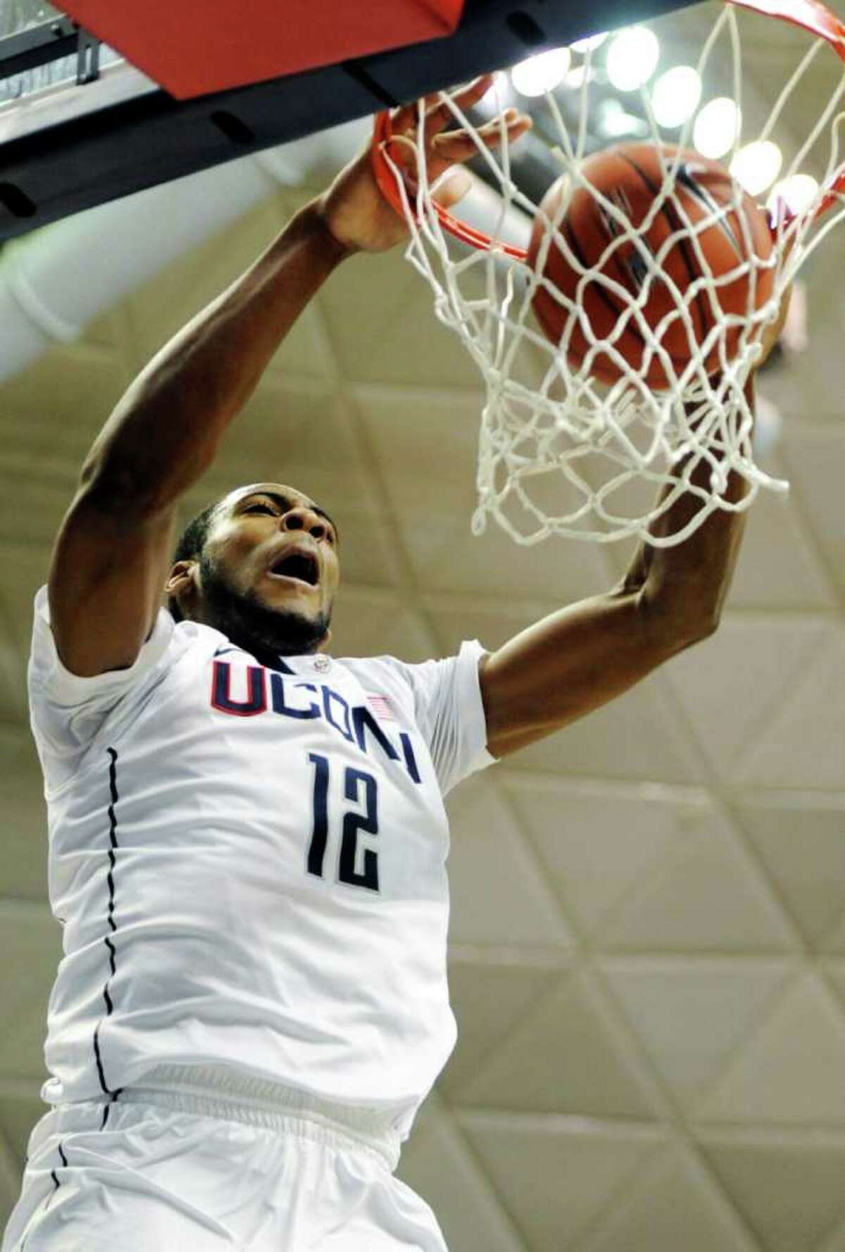 Connecticut's Andre Drummond dunks the ball in the second half of an NCAA college basketball game against Cincinnati in Storrs, Conn., Wednesday, Jan. 18, 2012. Cincinnati won 70-67. (AP Photo/Jessica Hill)