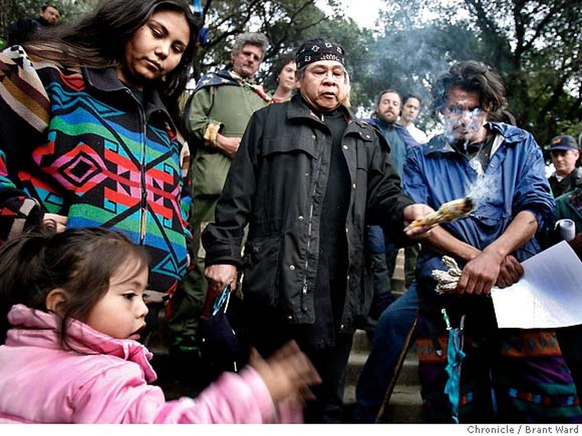 stadium233.JPG L-R Morning Star Gali and her daughter Talissa, Wounded Deocampo, and Zachary Running Wolf (blue shirt) were among the activists calling on the university to save the tree area where native Americans are buried. At the tree grove in front of Memorial stadium on the UC Berkeley campus, activists were joined by native Americans in demanding the university not dig up human remains they say are buried here. A tree-sitting protest has been going on for months to save oak and redwood trees scheduled to be removed for a new athletic complex. {Brant Ward/San Francisco Chronicle}2/20/07