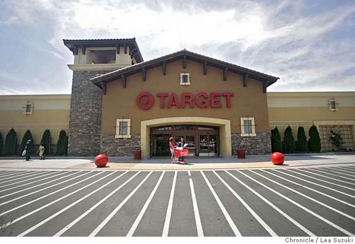 target14012_suzuki.jpg Front of the West entrance of Target on Trancas St. in Napa. Third assignment for Target14. A story on how the big box retailer is getting frisky in its architecture. This one isn't modernist like the others -- Napa wanted something that looks like a tuscan retreat -- but it was done in the spirit of vigorous fun and there are some nice touches, such as rough grout work over the fake stone and richly detailed wood inside the stubby tower. Photo taken on 8/15/05 in napa, CA. Photo by Lea Suzuki/ The San Francisco Chronicle