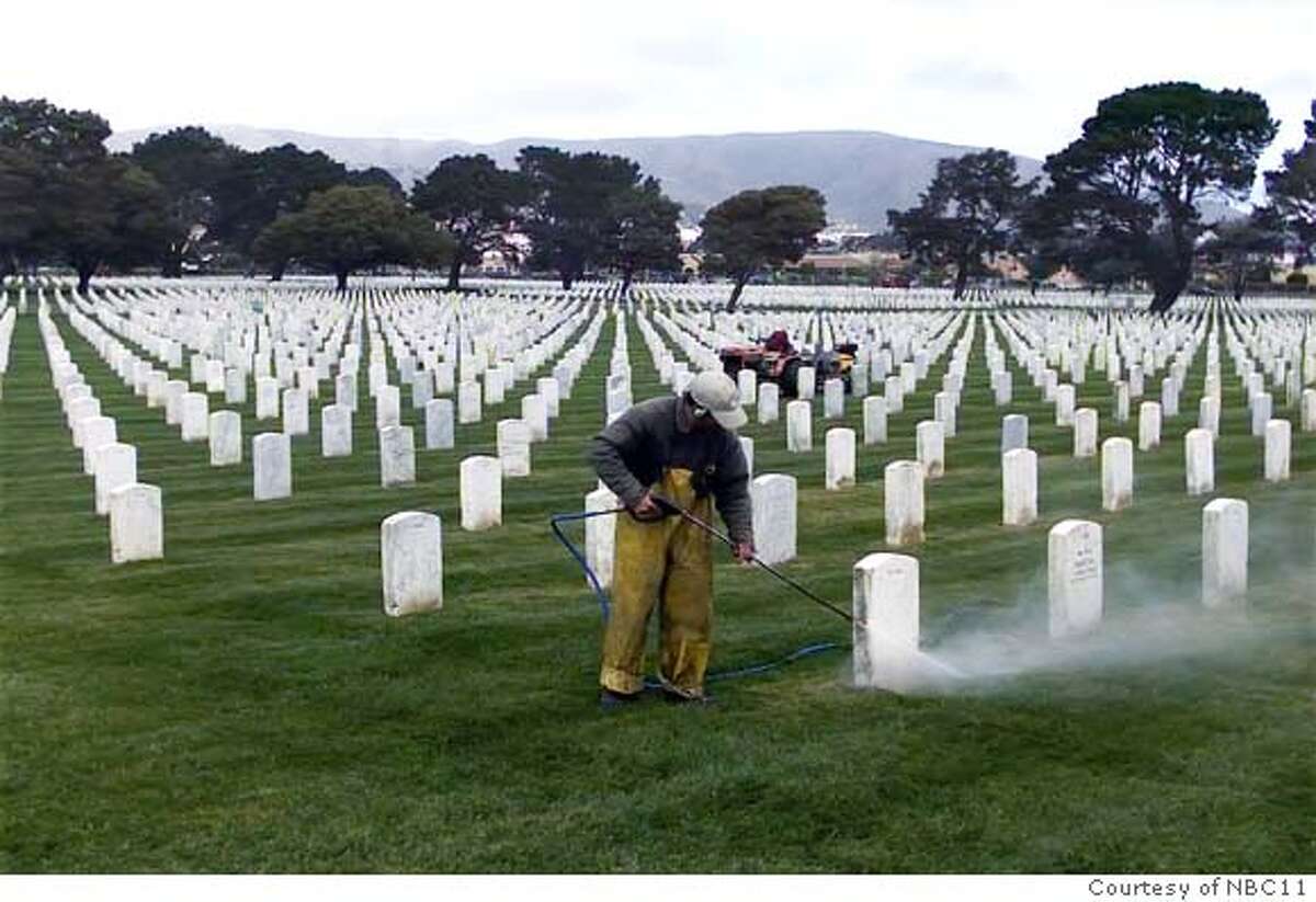 Photo from the caretaker of the veterans cemetery in Colma. This photo shows a caretaker powerwashing the sidewalk at the cemetary to keep it "pristine."
