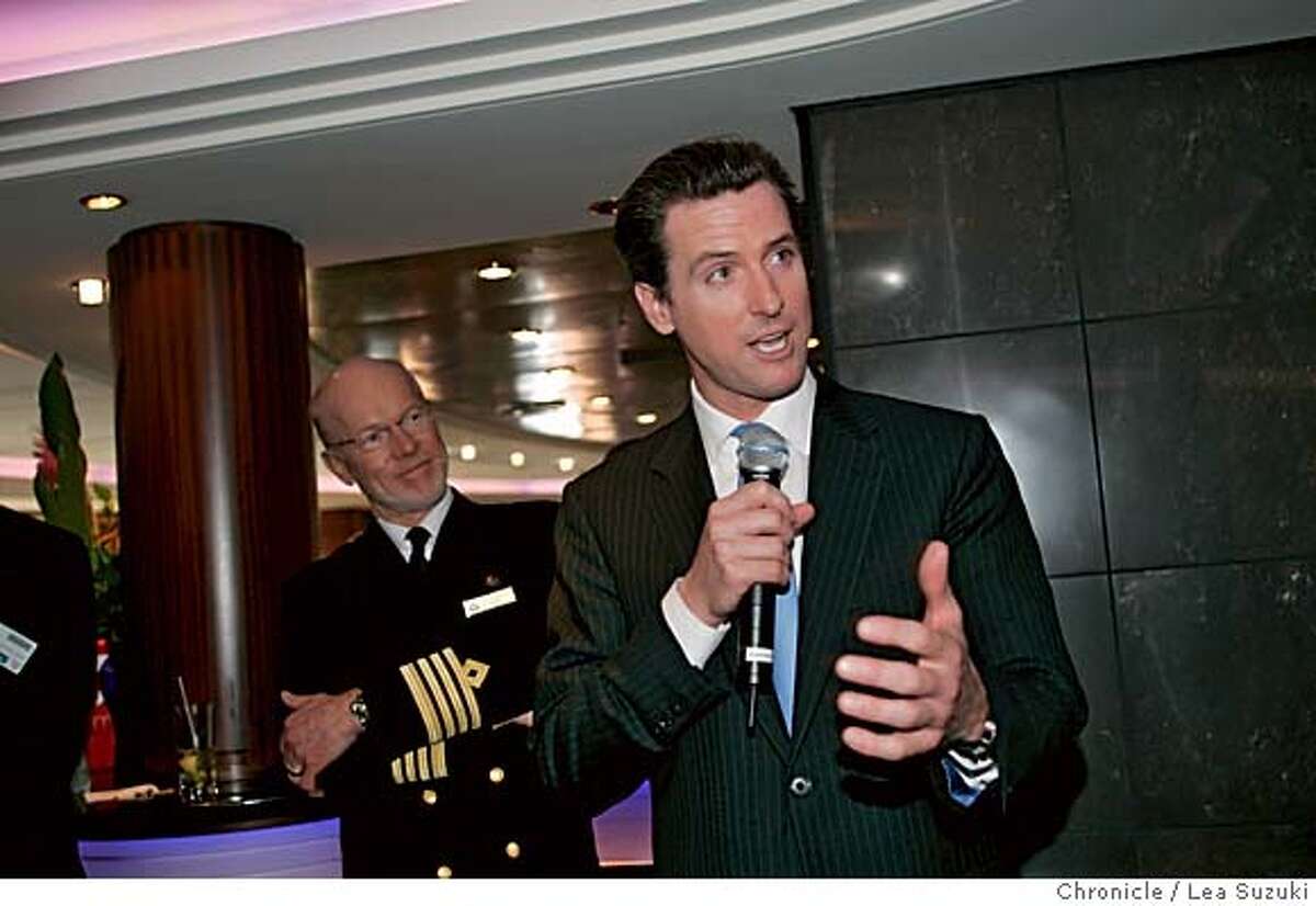 Mayor Gavin Newsom addresses the guests in the Commodore Club aboard the Queen Mary 2 before presenting Captain Christopher Rynd (left) with a proclomation. Media tours of the Queen Mary 2 and Mayor Newsom presents a proclomation to Captain Christopher Rynd on Monday, February 5, 2007. Photo by Lea Suzuki/The San Francisco Chronicle Photo taken on 2/5/07, in San Francisco, CA. **(themselves) cq.