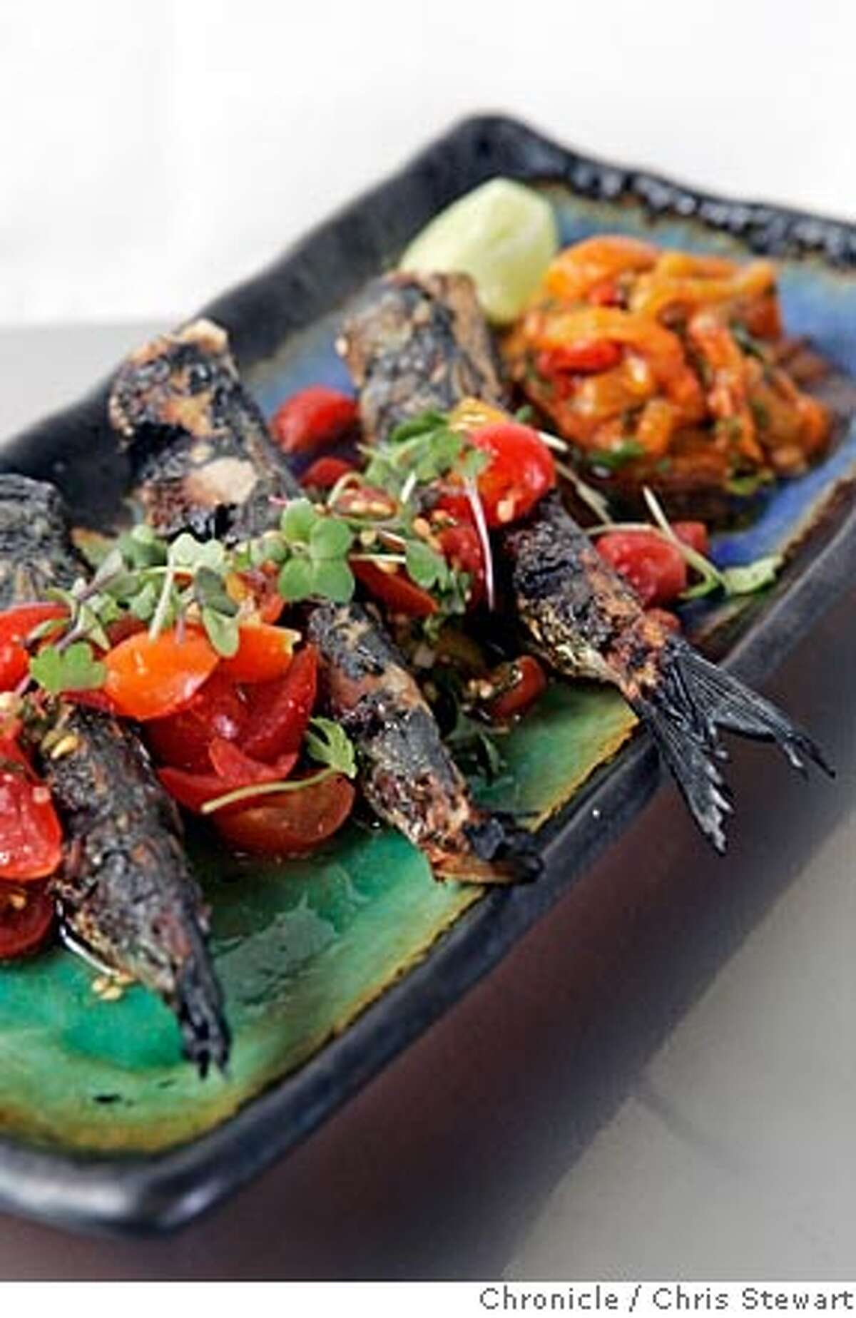 Event on 7/21/05 in Berkeley. A new restaurant in Berkeley called Sea Salt is featuring dishes such as the grilled local sardines with marinated roasted peppers and tomato-mint vinaigrette. The restaurant is located at 2512 San Pablo Avenue. Chris Stewart / The Chronicle