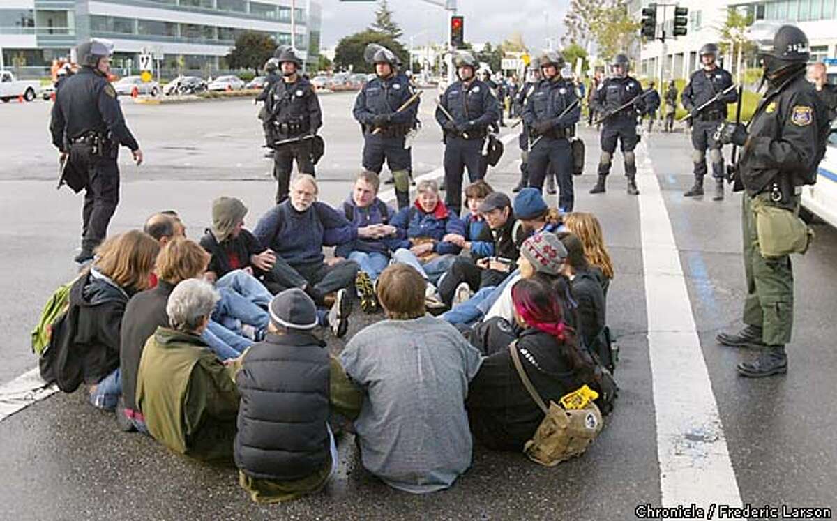 Defense giant endures protest / Peaceful arrests at Lockheed's gates