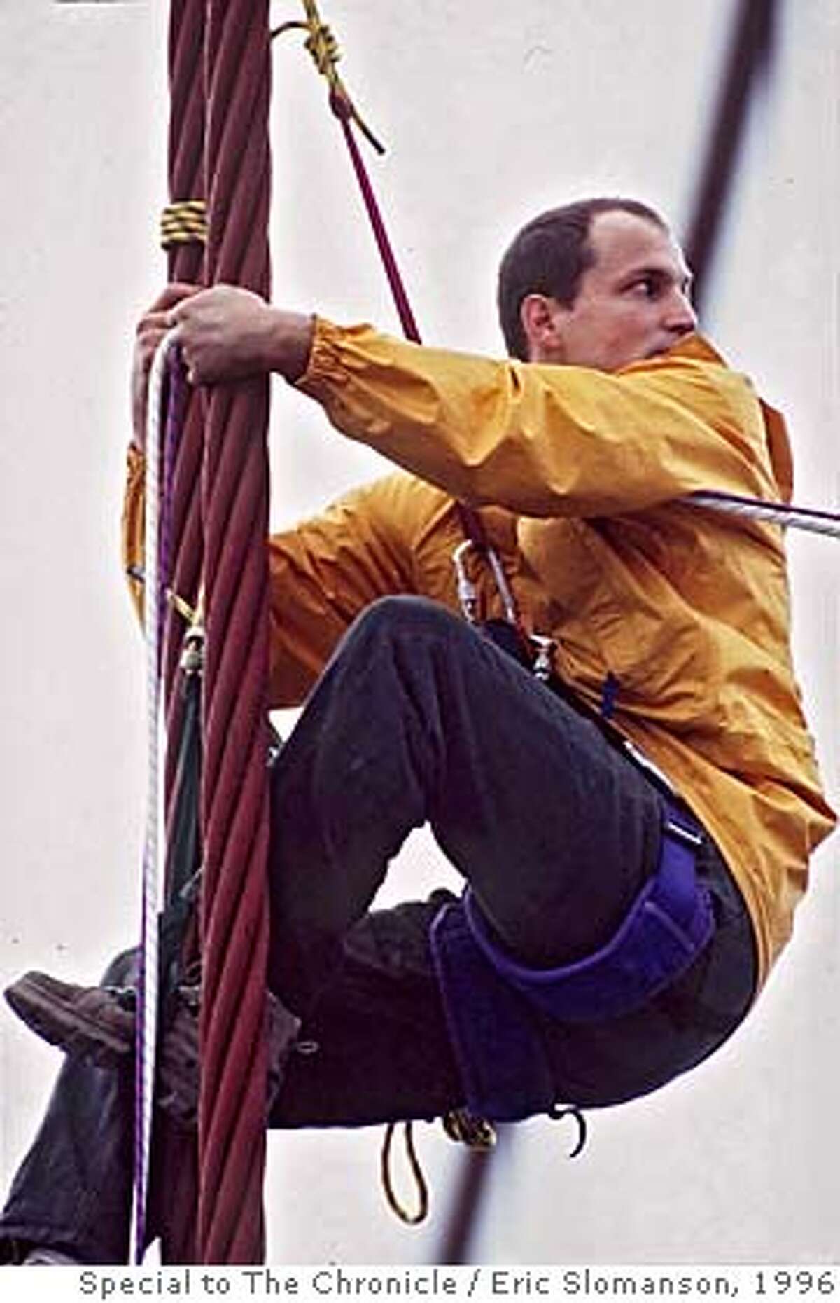 WOODY-BRIDGE/c/23NOV96/MN/FREE;ES ---- is shown climbing on the supports of the Golden Gate Bridge during a Headwaters protest on November 23rd. He was arrested with other demonstrators, and was arraigned for the offense today (1/14/97) in SF. FILE Photo / Special to The Chronicle by Eric Slomanson ALSO RAN: 6/30/97