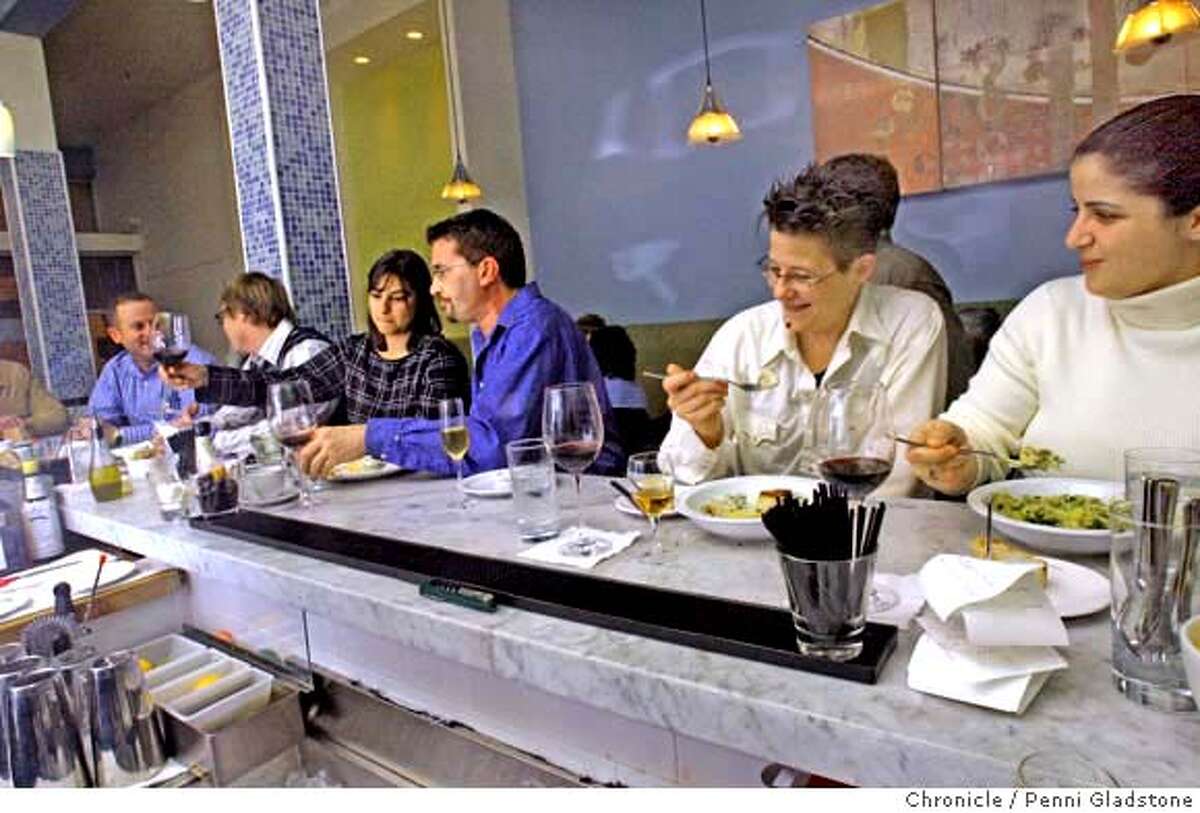 �Customers sit at the counter and have dinner Pescheria is a small seafood restaurant, patterened after the small coast-side restaurants in Italy. Event on 1/2/07 in San Francisco. Penni Gladstone / The Chronicle MANDATORY CREDIT FOR PHOTOG AND SF CHRONICLE/ -MAGS OUT