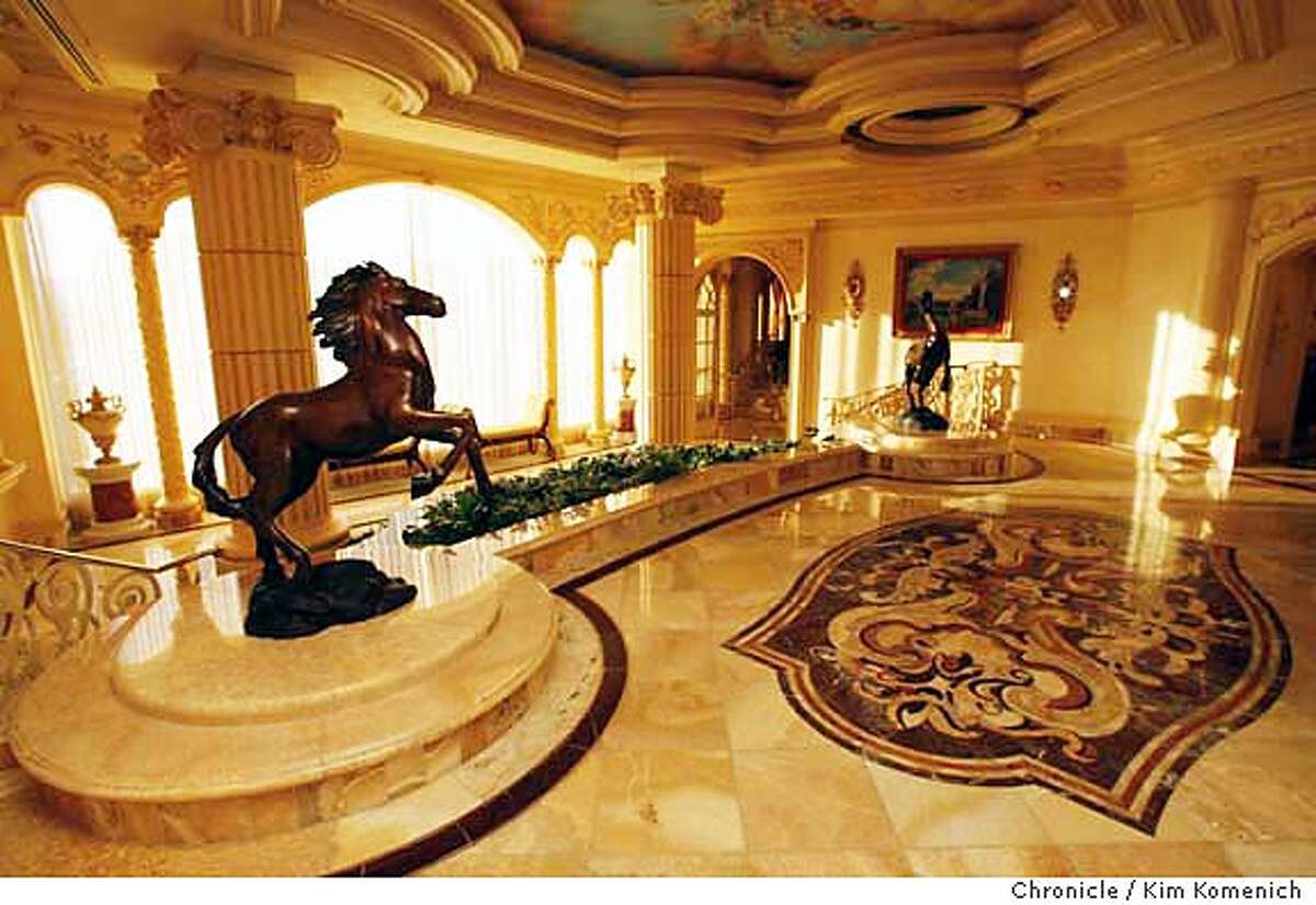 The expansive entryway of the Verona Sky Villa at the Las Vegas Hilton, with its Italian marble foors and bronze statues, is a preview of the rest of the city's largest suite. Chronicle photo by Kim Komenich