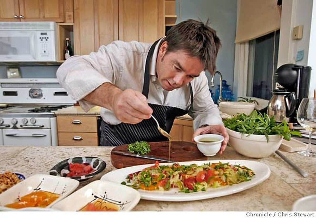 Chef17_0041_cs.jpg Mark Sullivan adds a drizzle of olive oil to his salad. Sullivan, chef/owner of Village Pub, at his San Francisco home preparing one of his favorite recipes, Fennel & Citrus Salad with Olives and Parmesan, January 8, 2007. Sullivan opens Spruce, his new restaurant, in early April. Chris Stewart / The Chronicle MANDATORY CREDIT FOR PHOTOG AND SF CHRONICLE/ -MAGS OUT